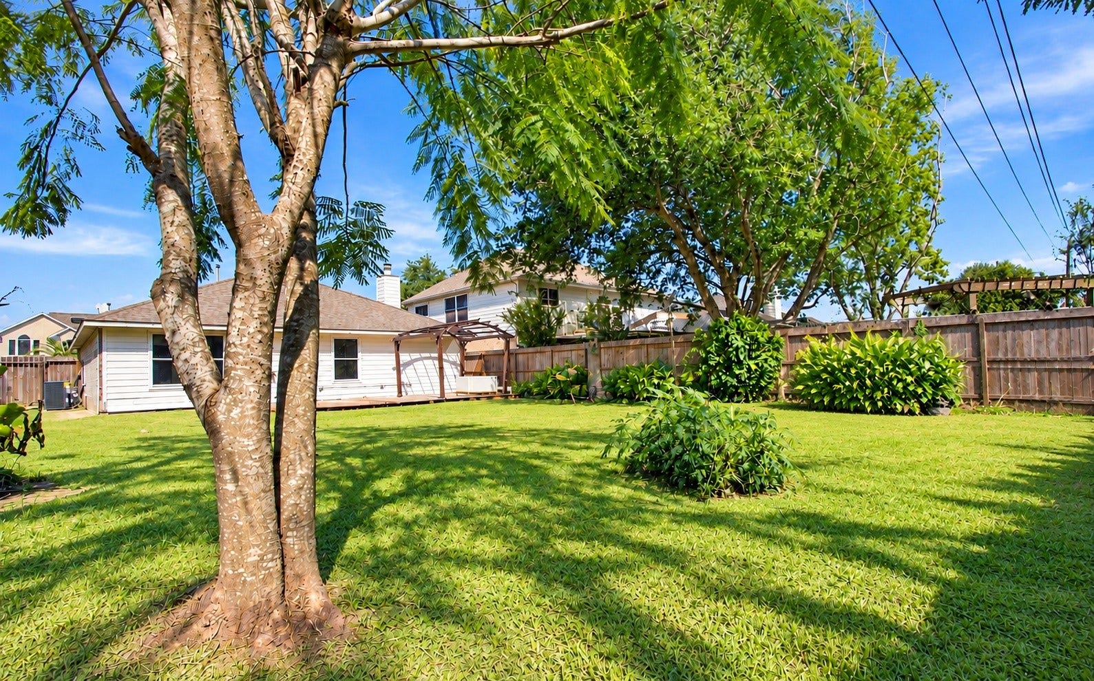 5226 Chasewood Drive, Bacliff, TX 77518 An angle of the backyard!
