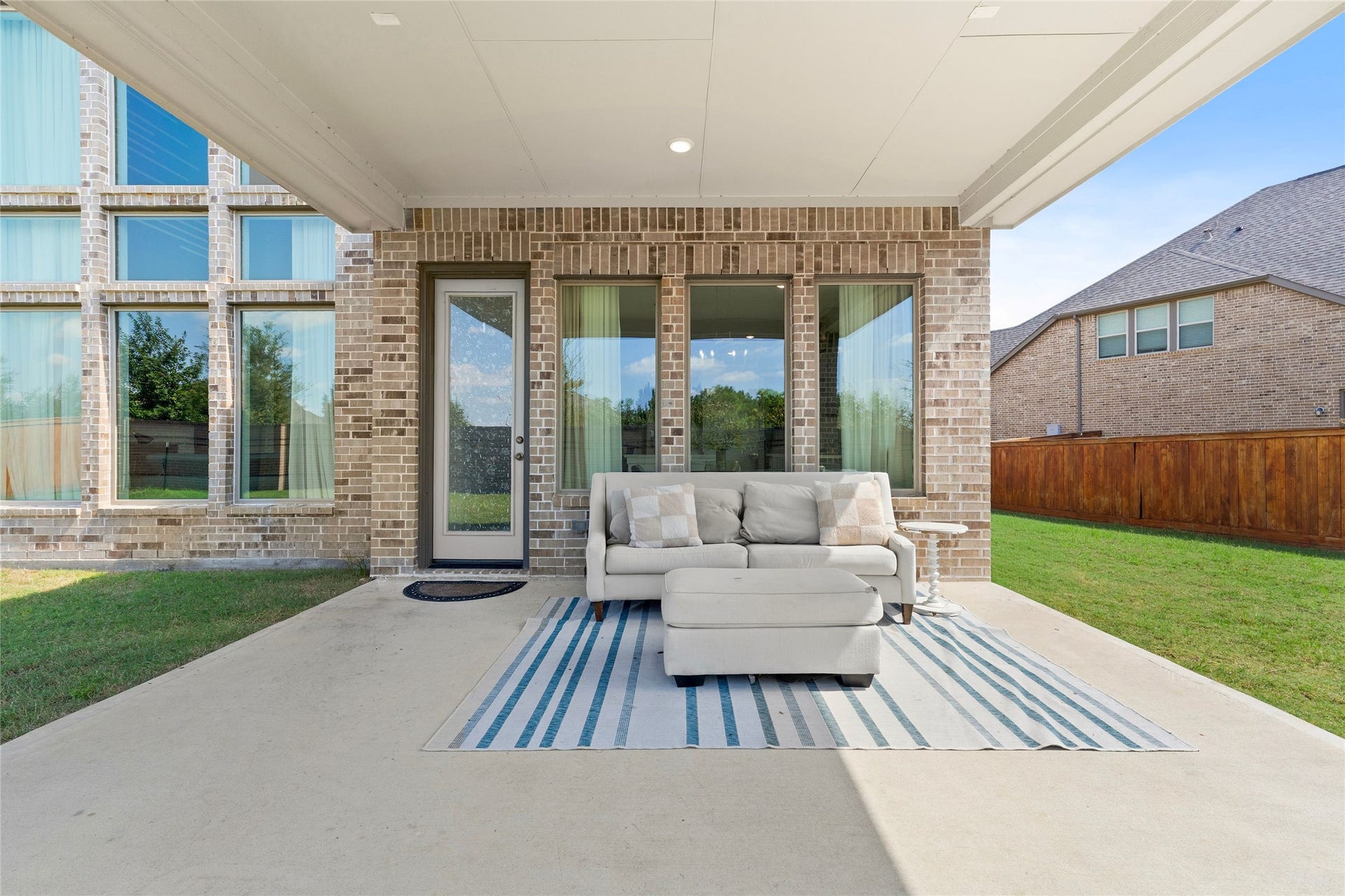 11111 Zinnias Court, Cypress, TX 77433 The covered patio provides a wonderful shaded retreat with plenty of room for comfortable seating and outdoor entertaining.