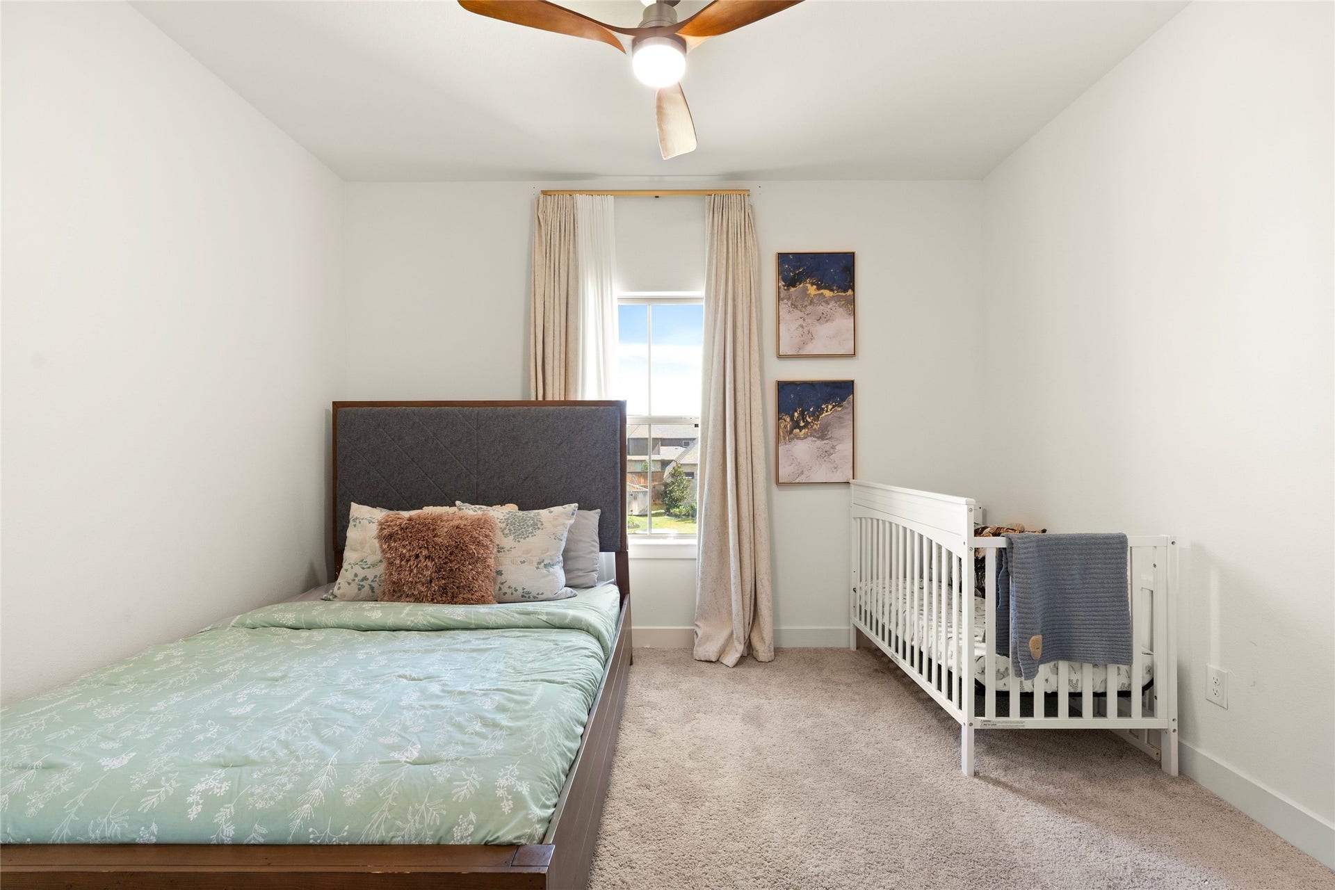 11111 Zinnias Court, Cypress, TX 77433 A comfortable secondary bedroom with soft natural light and a layout ready to make your own.