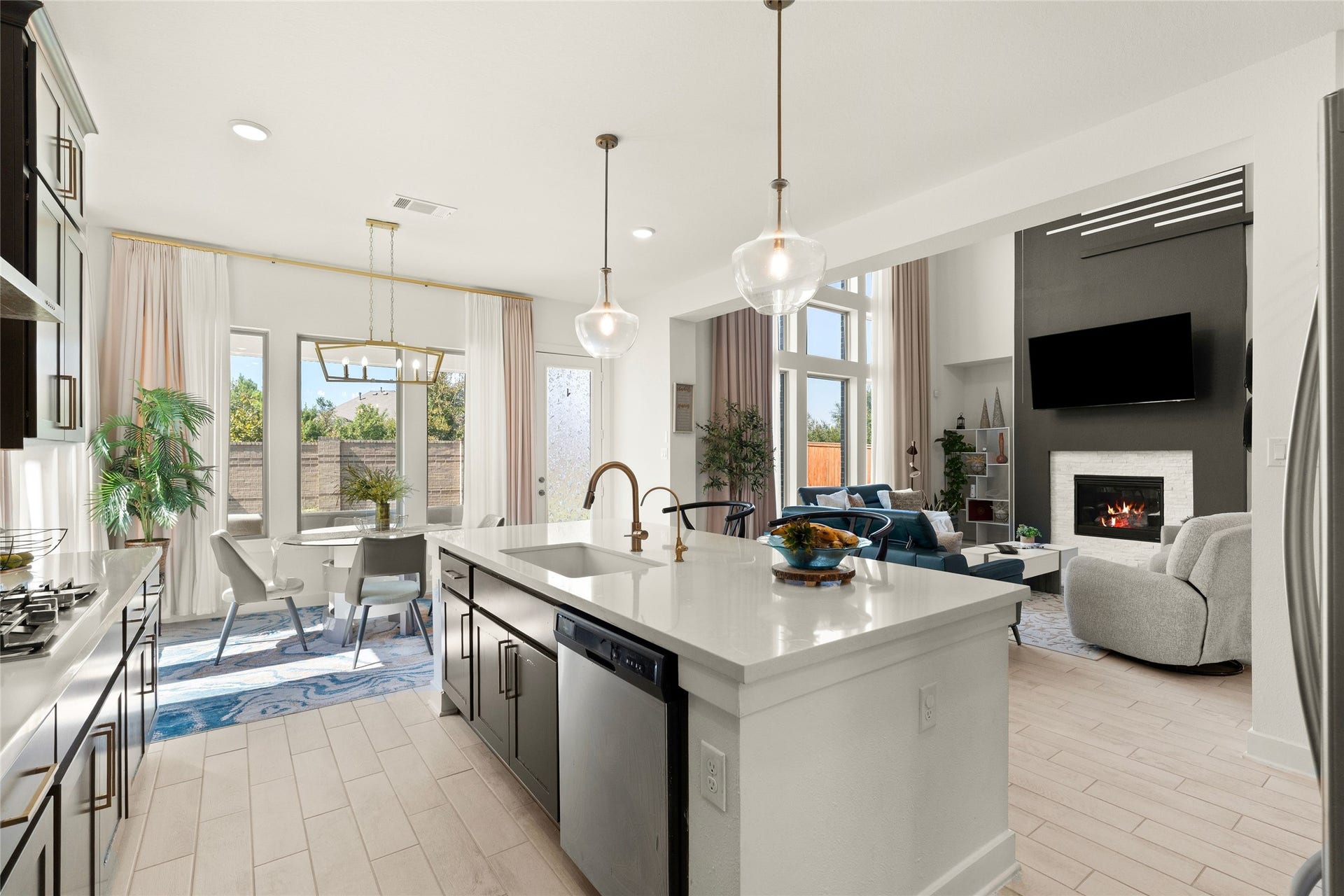11111 Zinnias Court, Cypress, TX 77433 From the beautiful kitchen island to the light-filled breakfast area, every detail makes this space inviting.