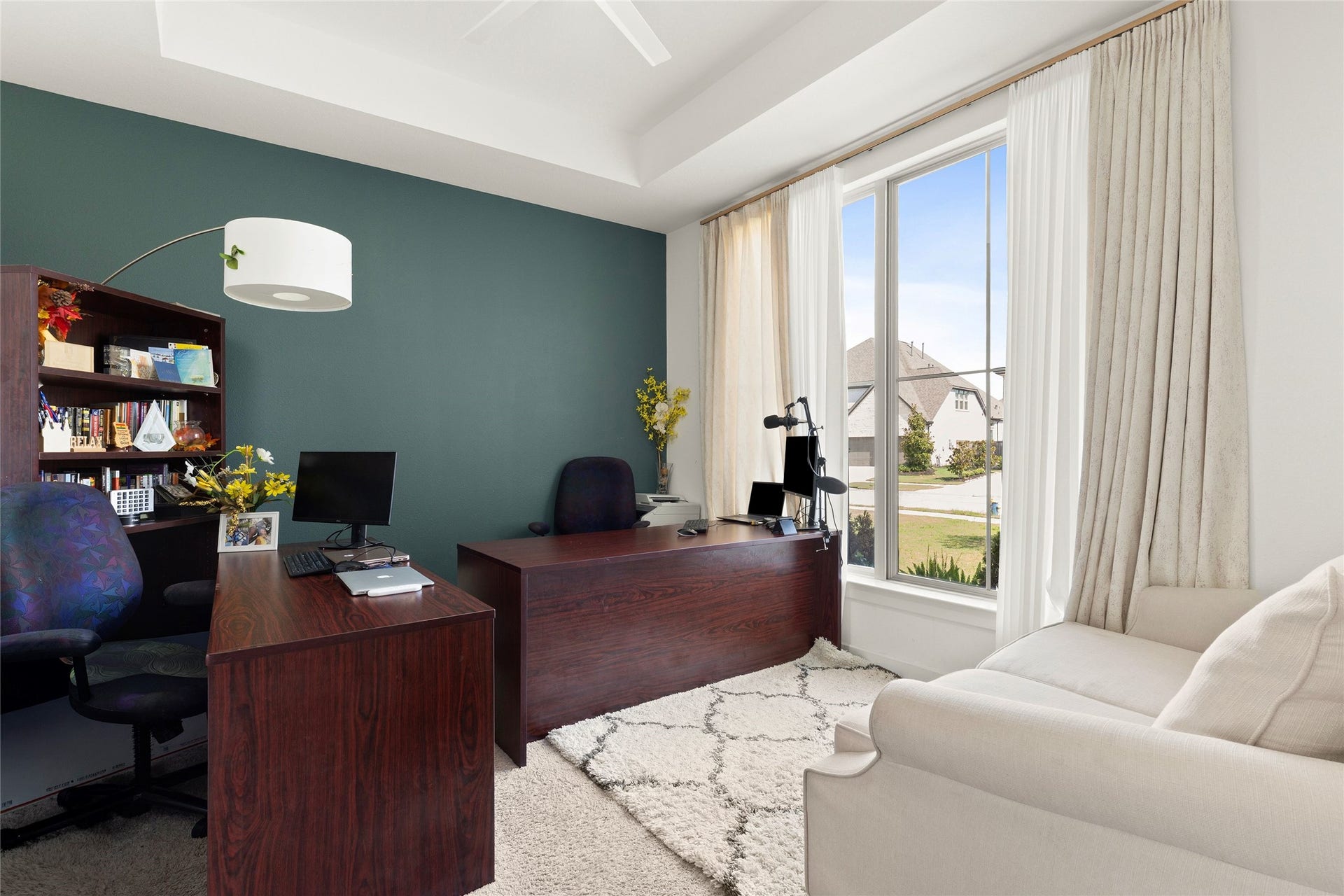 11111 Zinnias Court, Cypress, TX 77433 A dedicated home office with a beautiful accent wall and natural light creates an inspiring place to work.