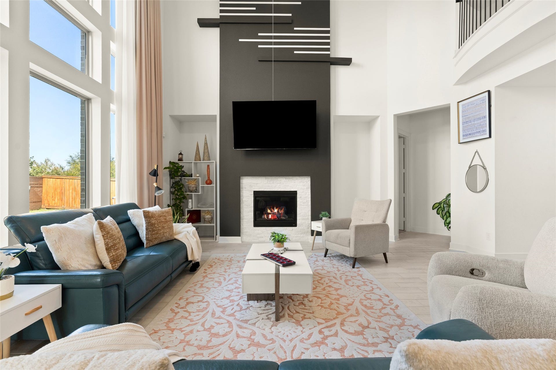 11111 Zinnias Court, Cypress, TX 77433 A stunning fireplace, soaring ceilings, and an open view toward the kitchen make this living space perfect for entertaining and everyday life.