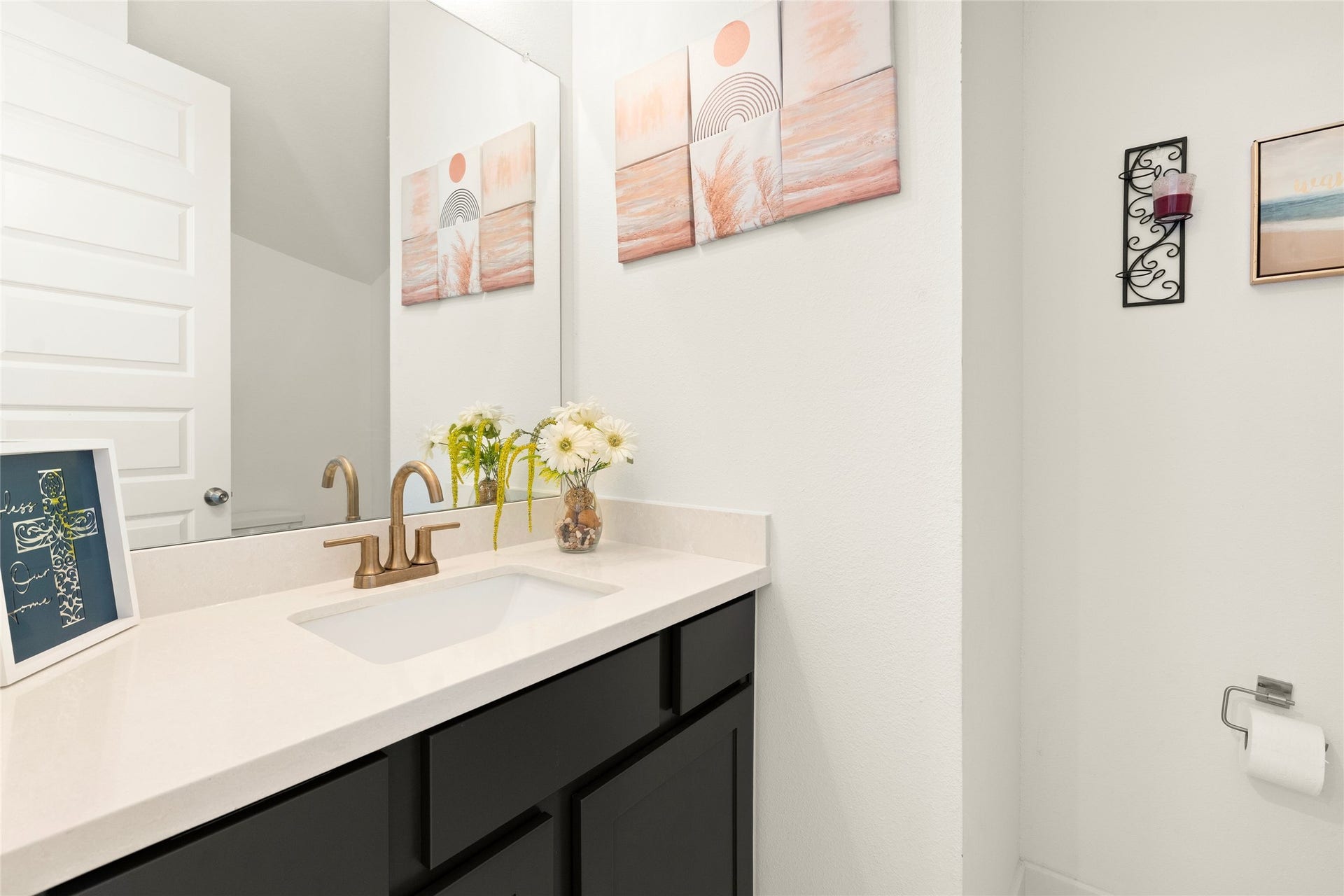 11111 Zinnias Court, Cypress, TX 77433 Even the smallest spaces make a statement! This beautifully appointed half bath adds a touch of charm and personality for guests.