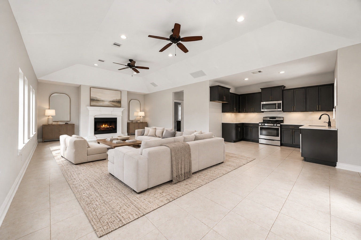 5127 Beekman Drive, Missouri City, TX 77459 Inside, the open living area impresses with soaring ceilings, dual ceiling fans, and a cozy fireplace, flowing seamlessly into the casitas full kitchen. Virtually staged.