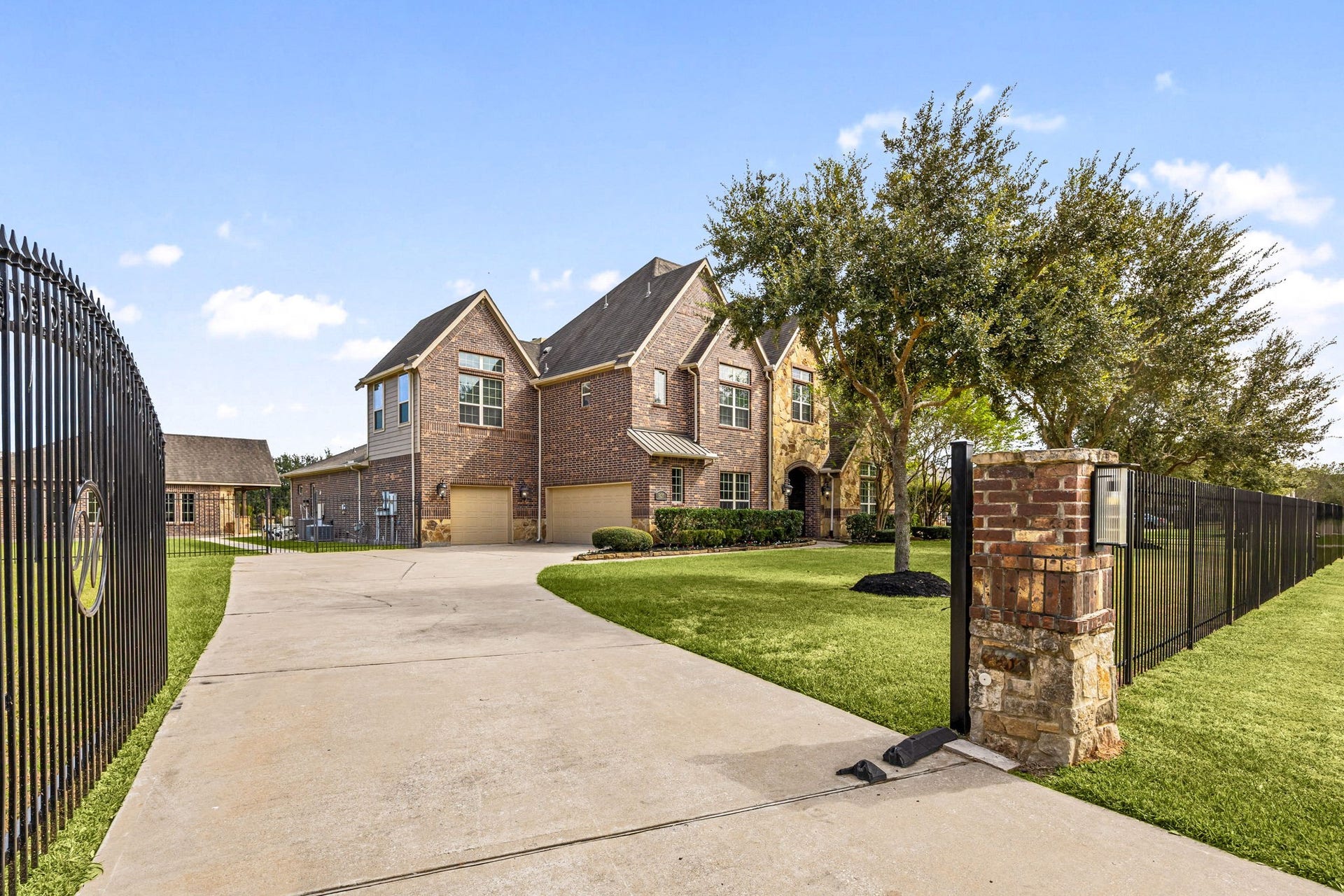 5127 Beekman Drive, Missouri City, TX 77459 Completing the acre-plus estate, the gated entrance and sweeping driveway provide access to the main residence, three-car garage, and detached casitaall within a private, beautifully maintained setting.