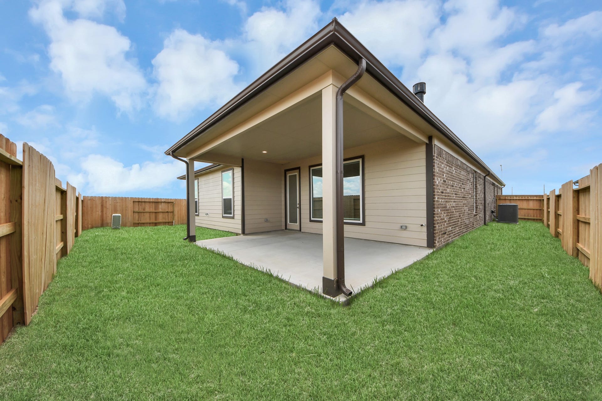 Explore the expansive backyard with its inviting covered patioa perfect blend of space for the kids to play and adults to unwind. Ideal for creating your outdoor oasis, this backyard accommodates patio furniture, a BBQ pit, and endless possibilities for leisure and entertainment. Sample photo of completed home with similar floor plan. Actual colors and selections may vary.
