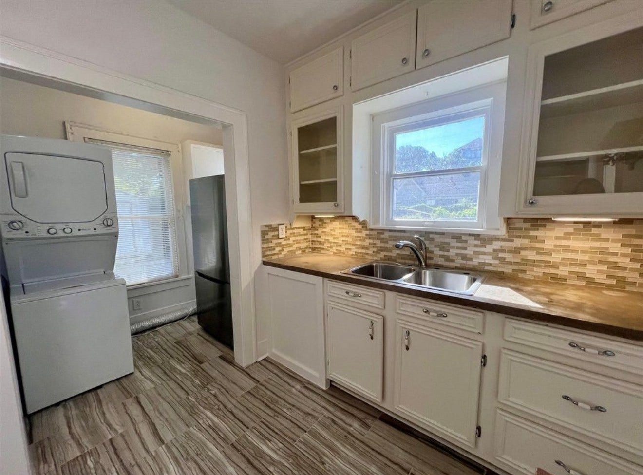 Each unit has an updated kitchen and its own stackable washer and dryer.