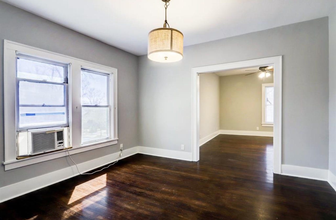 The separate dining room has hardwood floors and plenty of room for your dining room set. (Upstairs unit)