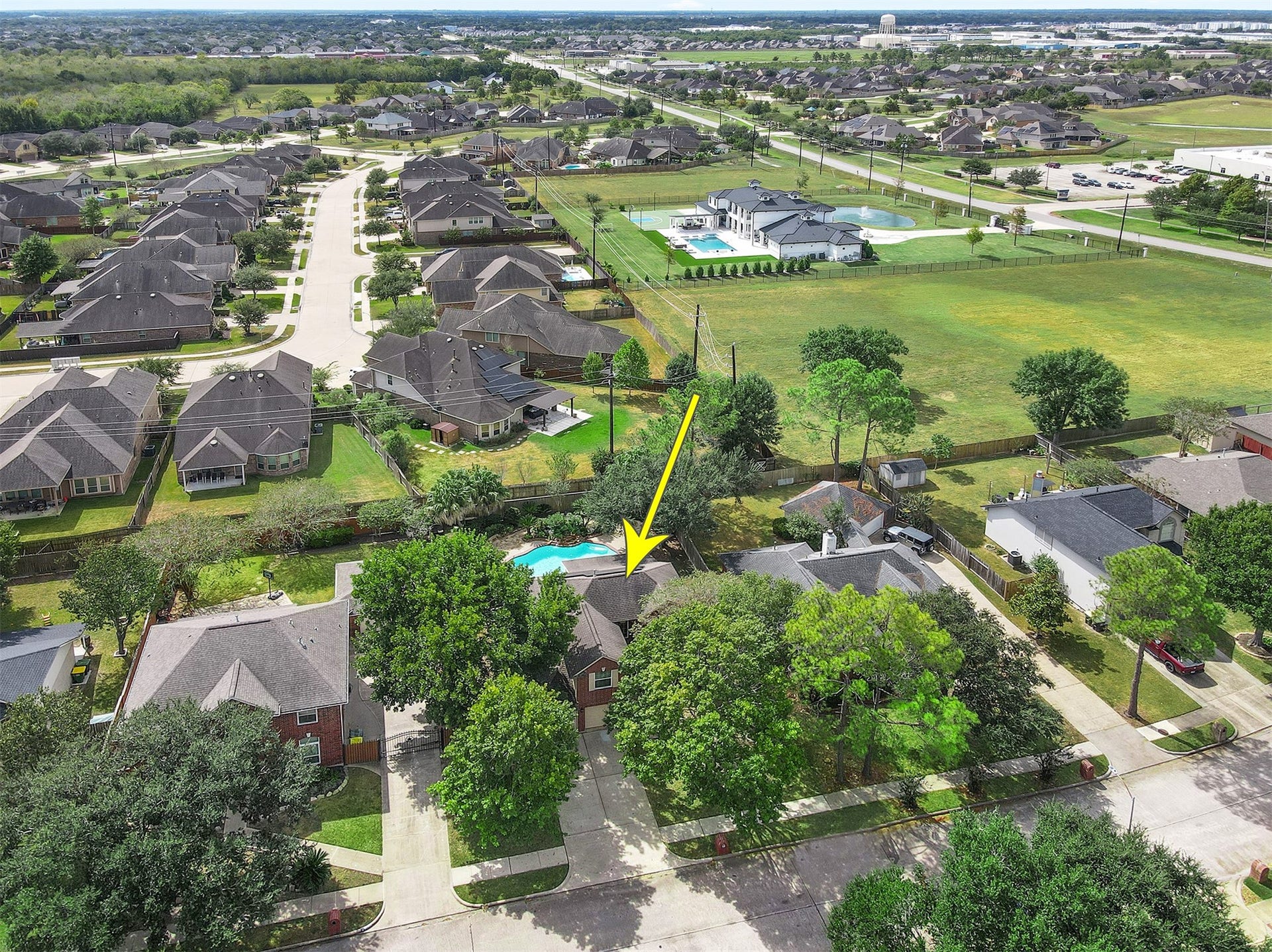 3424 Glastonbury Drive, Pearland, TX 77581 Charming home nestled in a serene suburban neighborhood, featuring a spacious backyard with a pool, surrounded by lush greenery and well-maintained properties. Perfect for families seeking tranquility and community.