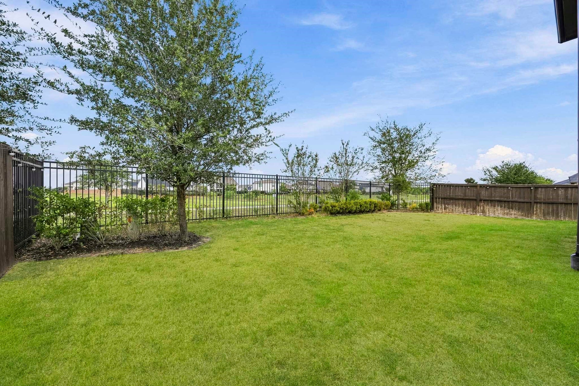 Sit back, relax and enjoy your gorgeous backyard while sitting under your large covered patio!