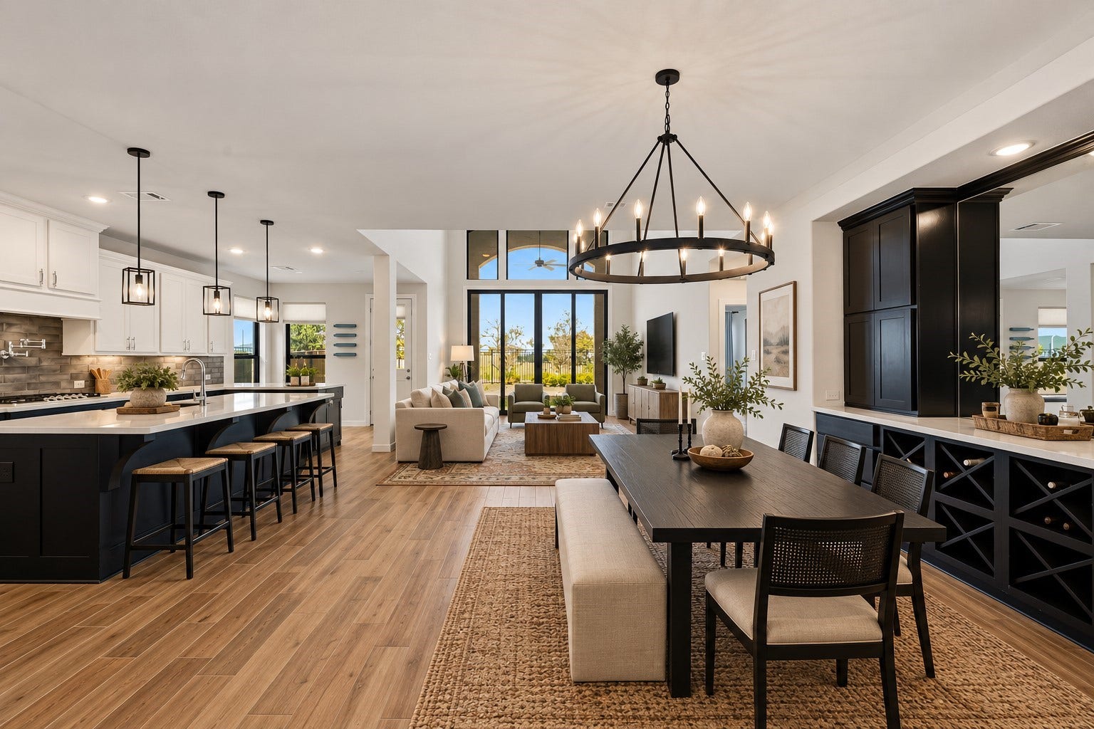 Step into this beautifully designed open-concept home, where modern elegance meets everyday comfort. The airy living space is bathed in natural light, seamlessly connecting to the dining area, a covered patio, and private backyardperfect for relaxing or entertaining. The sleek kitchen boasts white cabinetry, chic pendant lighting, and a spacious island, making it the heart of the home. Dont miss this stunning retreat! *This photo has been virtually staged
