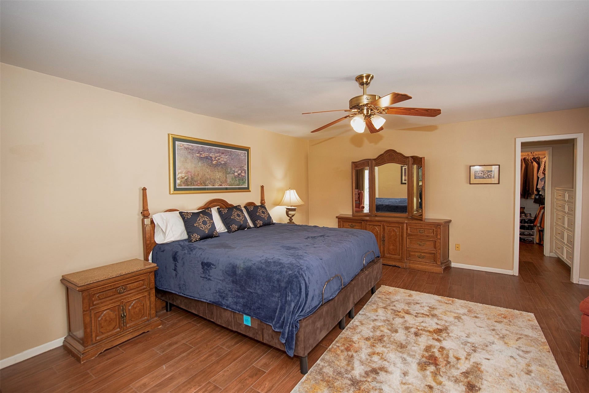 18502 Vinland Drive, Nassau Bay, TX 77058 Huge primary suite with gorgeous wood floors and plenty of space for your king sized furniture.