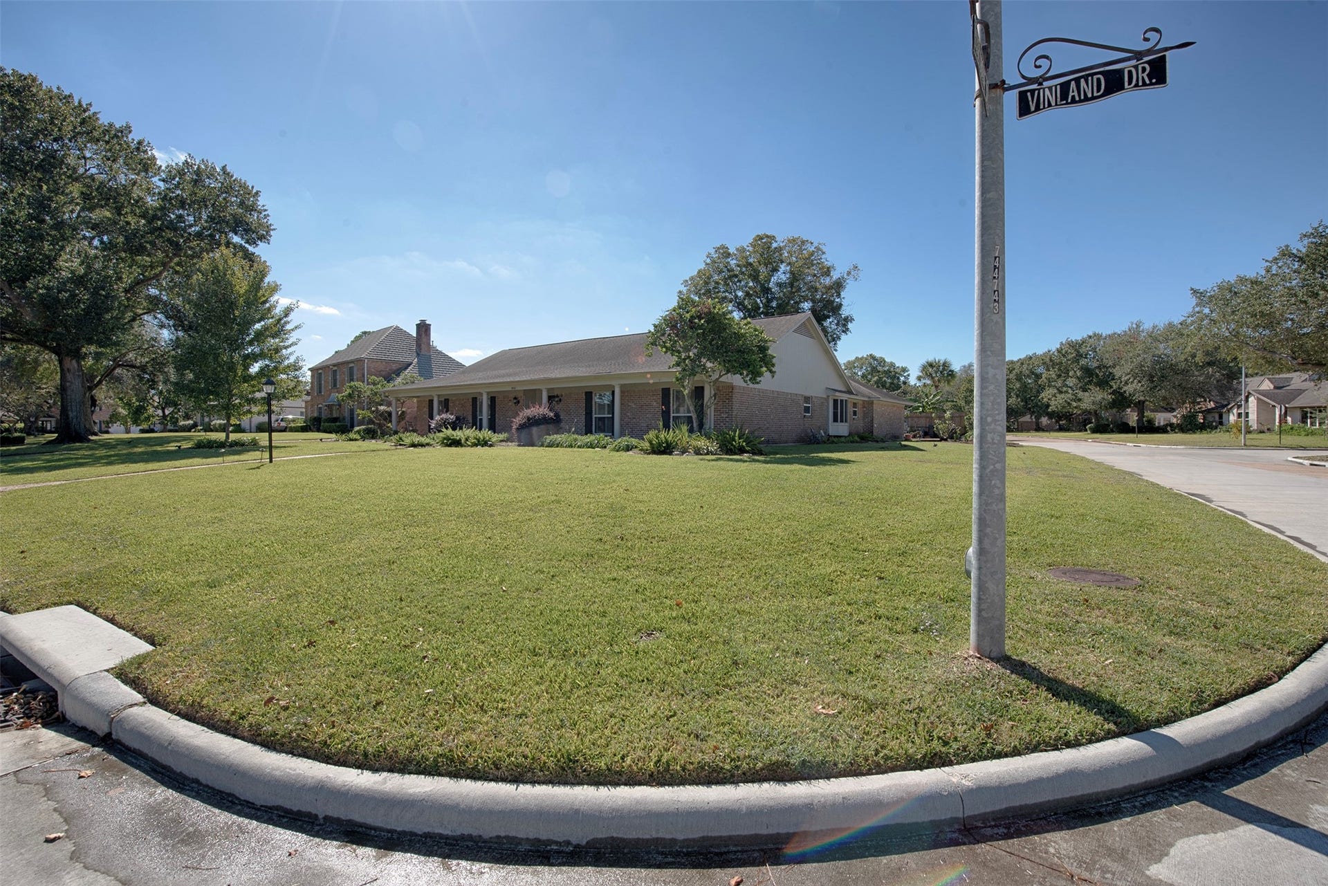 18502 Vinland Drive, Nassau Bay, TX 77058 Home is located on a corner lot with tremendous space for the kids to play in this amazing quiet neighborhood.
