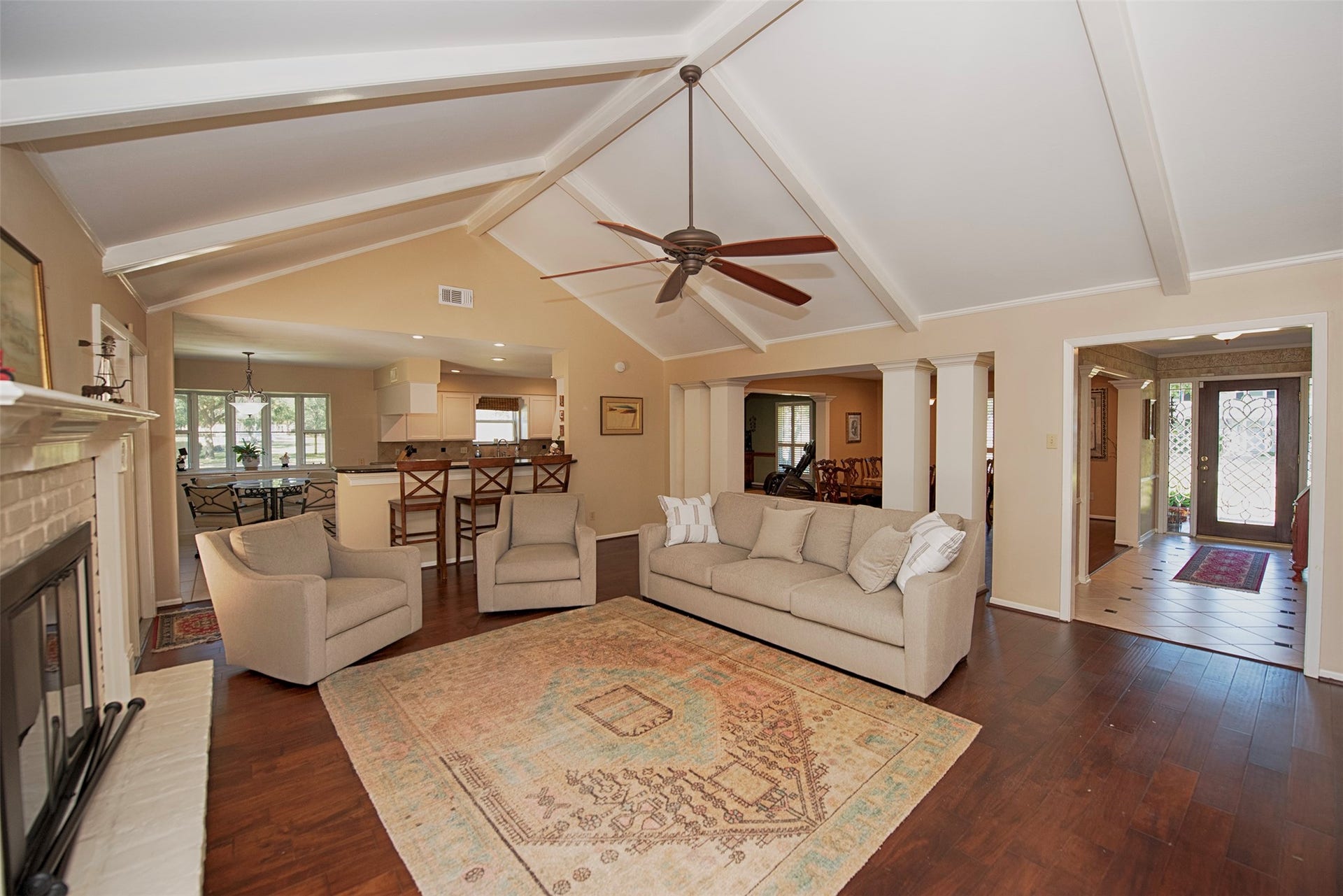 18502 Vinland Drive, Nassau Bay, TX 77058 A view of the family room with open space not only to the kitchen area but even the foyer and formal dining room. Imagine the great fun entertaining this holiday season.