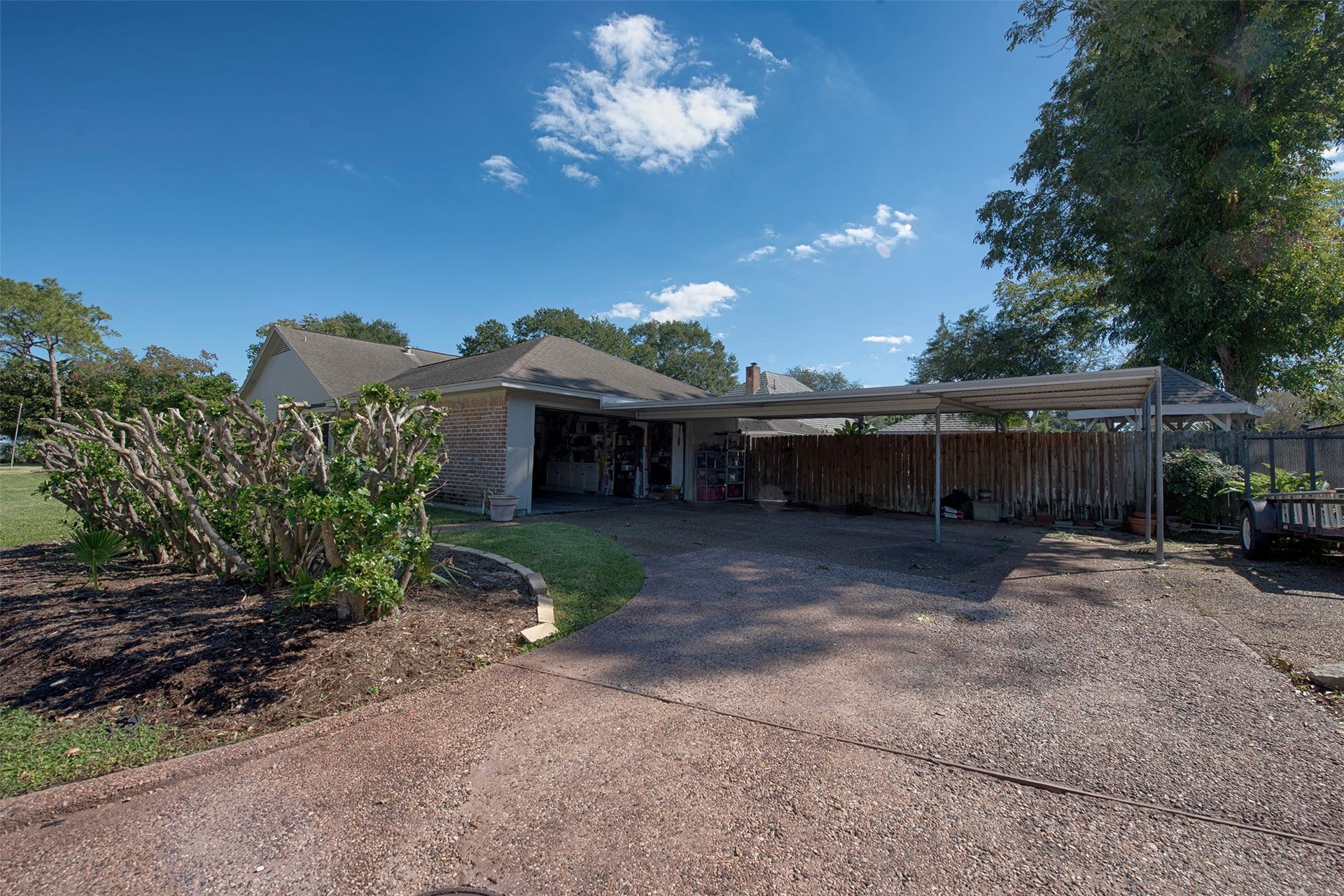 18502 Vinland Drive, Nassau Bay, TX 77058 Home provides a 3 car carport and two car garage. The carport is perfect for the weekend car fixer upper in the family.