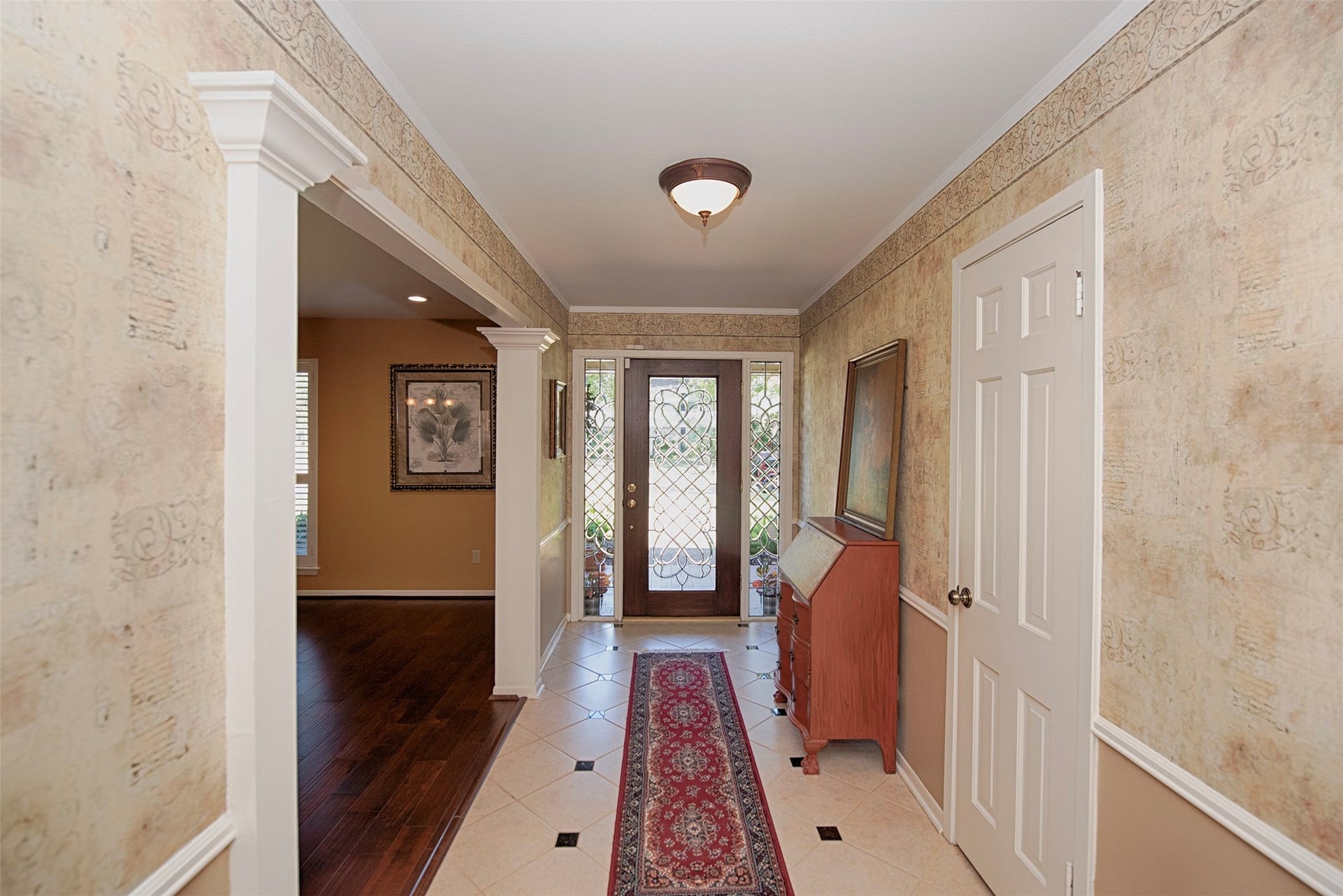 18502 Vinland Drive, Nassau Bay, TX 77058 Entry to the home is a gorgeous foyer with tiled floors with granite inlays as you approach the formal dining room.