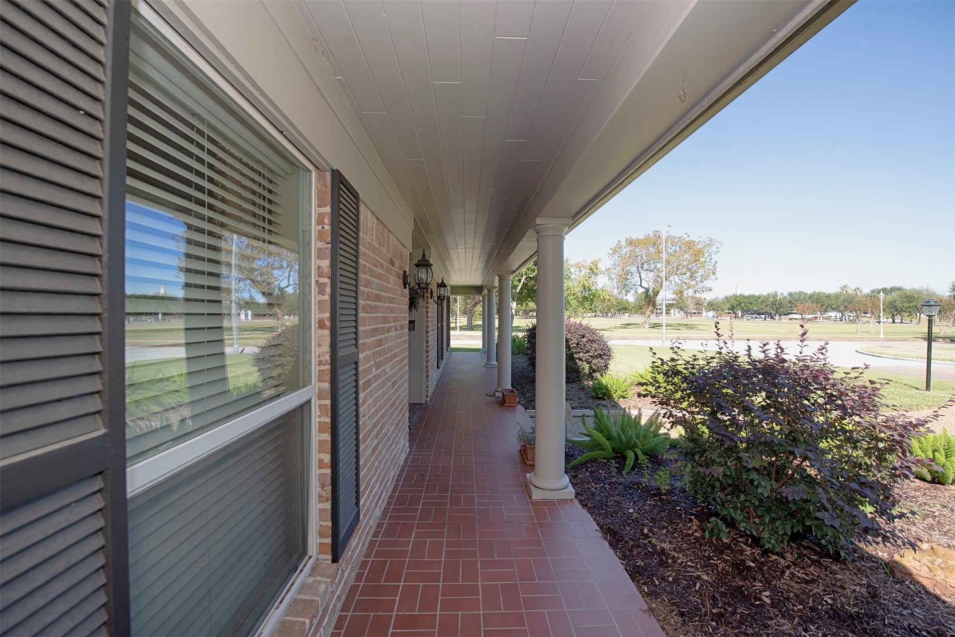 18502 Vinland Drive, Nassau Bay, TX 77058 Amazing front porch for relaxing in the evening while watching the kids play.