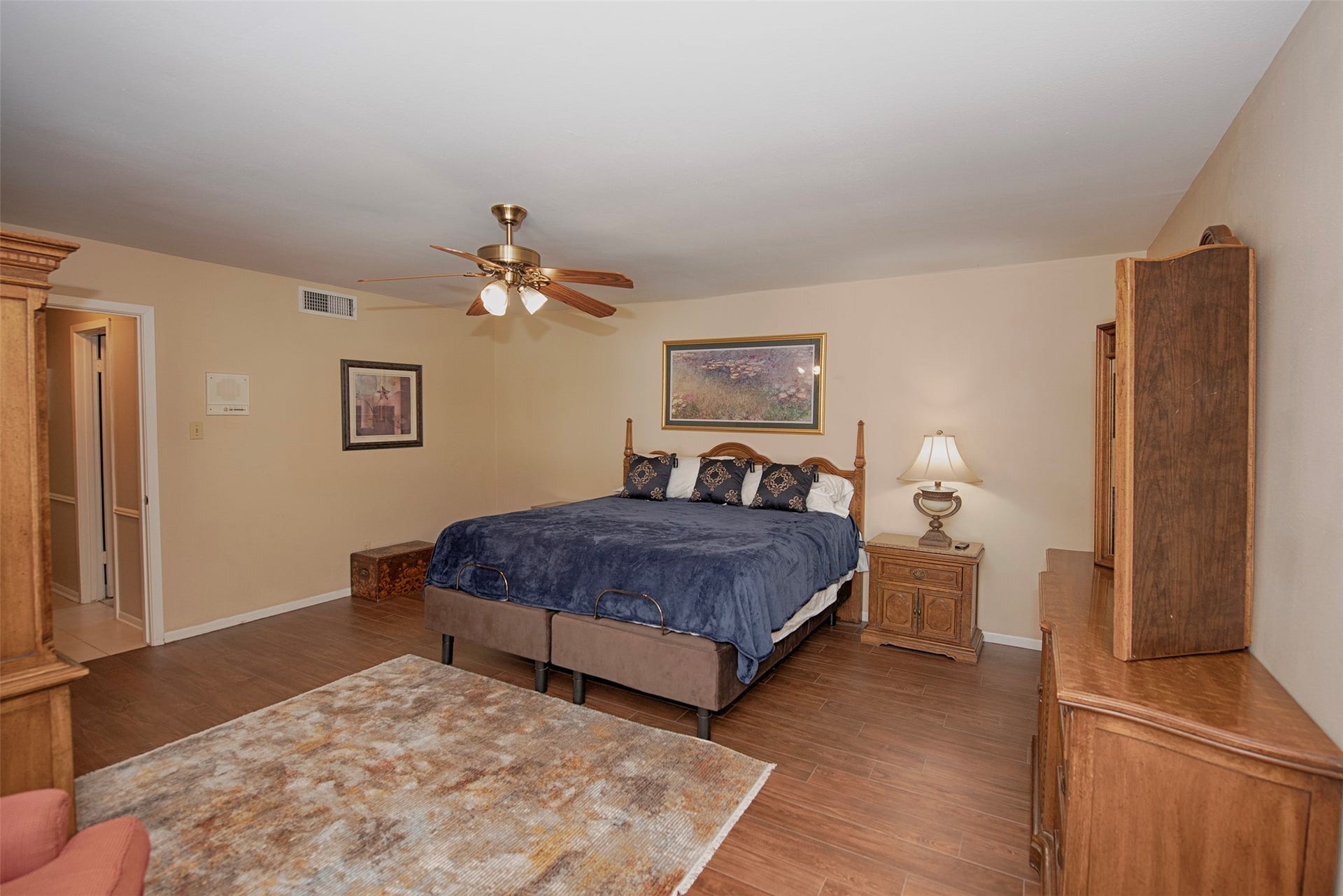 18502 Vinland Drive, Nassau Bay, TX 77058 Another view of the primary bedroom showing the enormous space. There is also private access to the patio and pool.