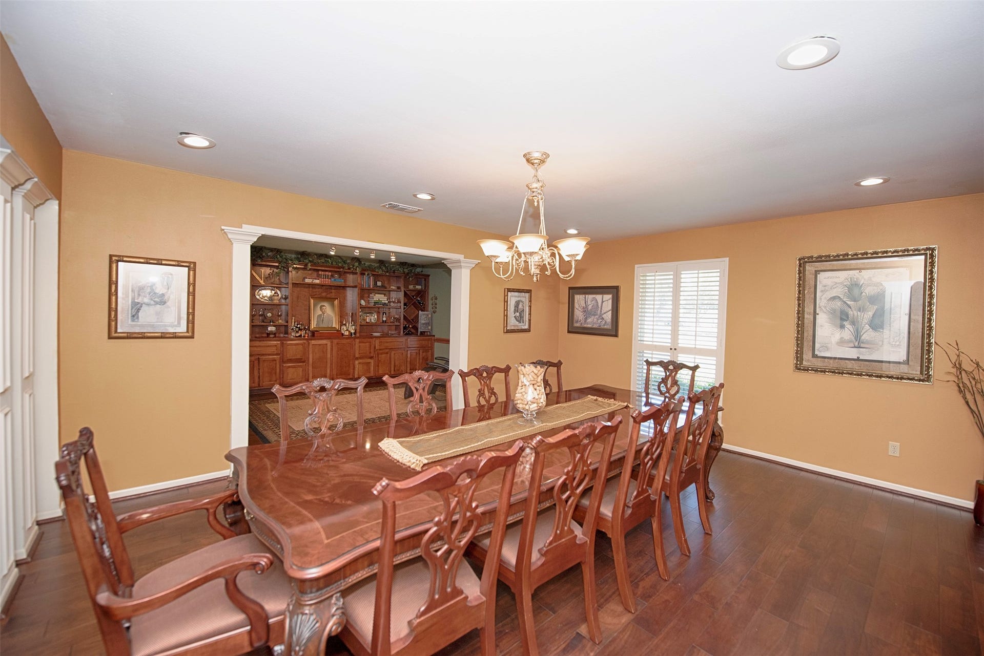 18502 Vinland Drive, Nassau Bay, TX 77058 Dining room updated with gorgeous wood floors and easy access to a den which will provide great storage for china, spirits and your favorite stemware.