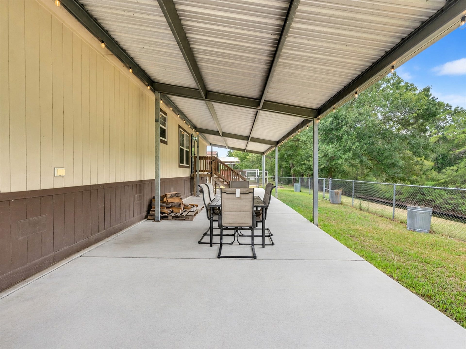 52 County Road 302, Alvin, TX 77511 Back covered patio- 64x15 with concrete
