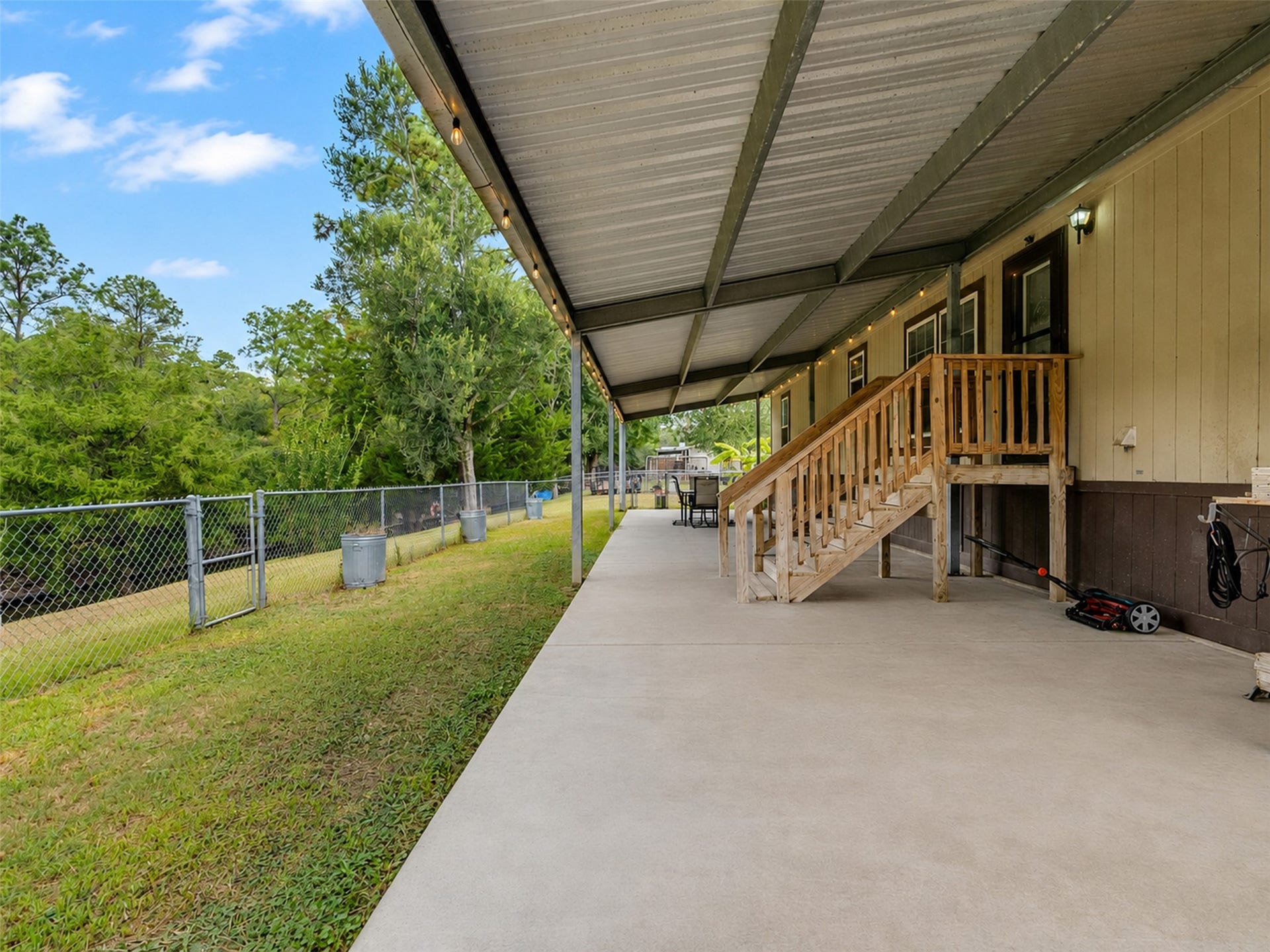 52 County Road 302, Alvin, TX 77511 Back covered patio- 64x15 with concrete