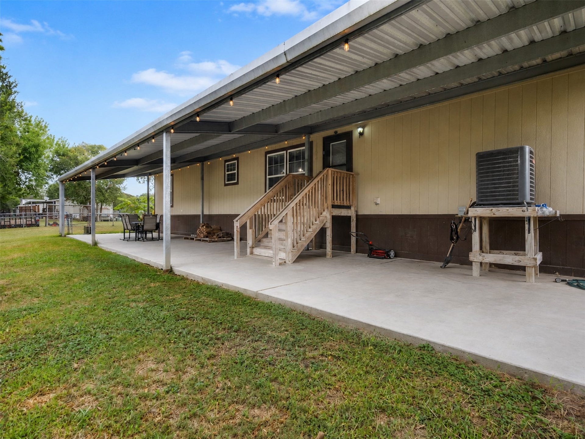 52 County Road 302, Alvin, TX 77511 Back covered patio- 64x15 with concrete