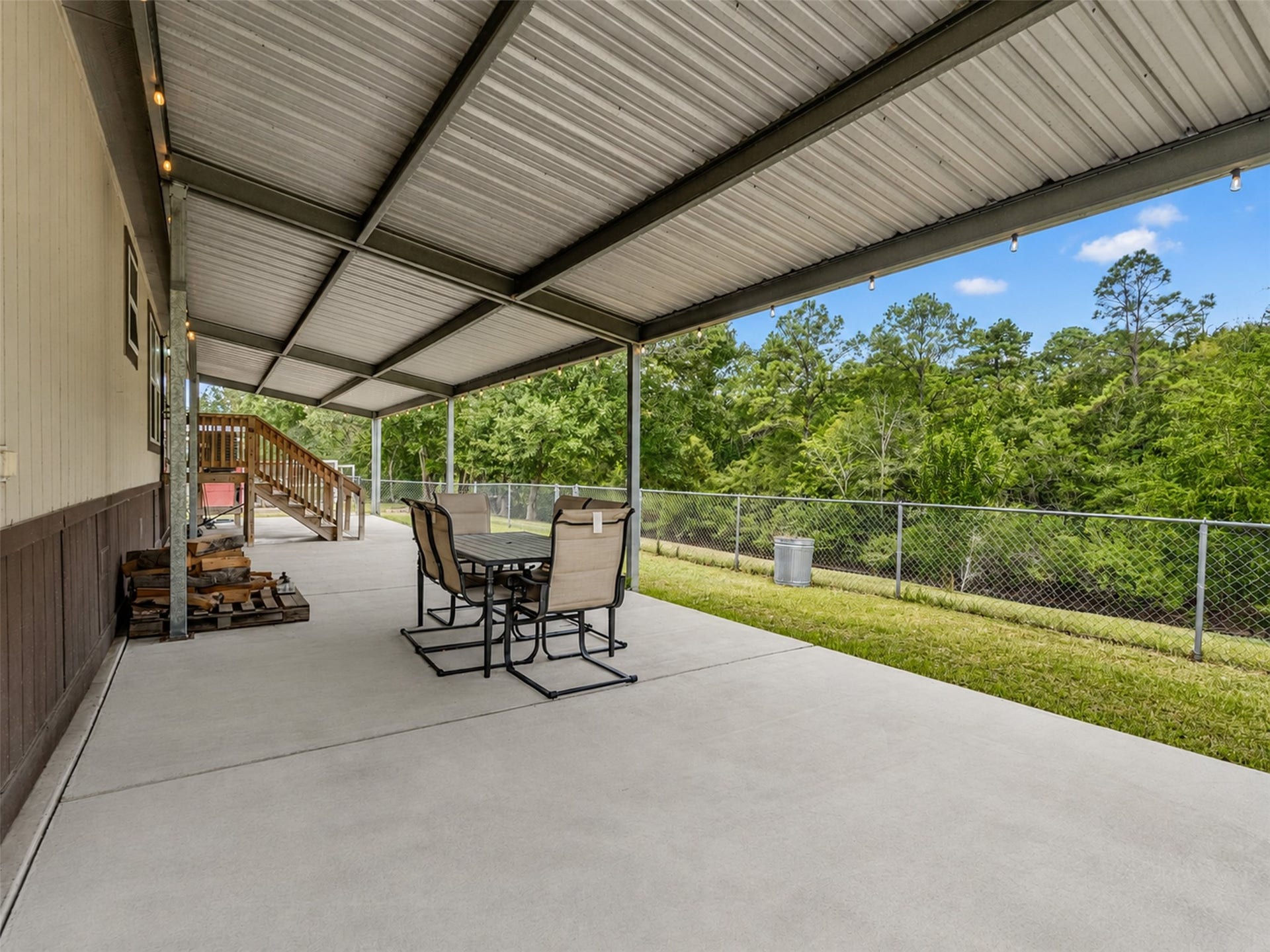 52 County Road 302, Alvin, TX 77511 Back covered patio- 64x15 with concrete