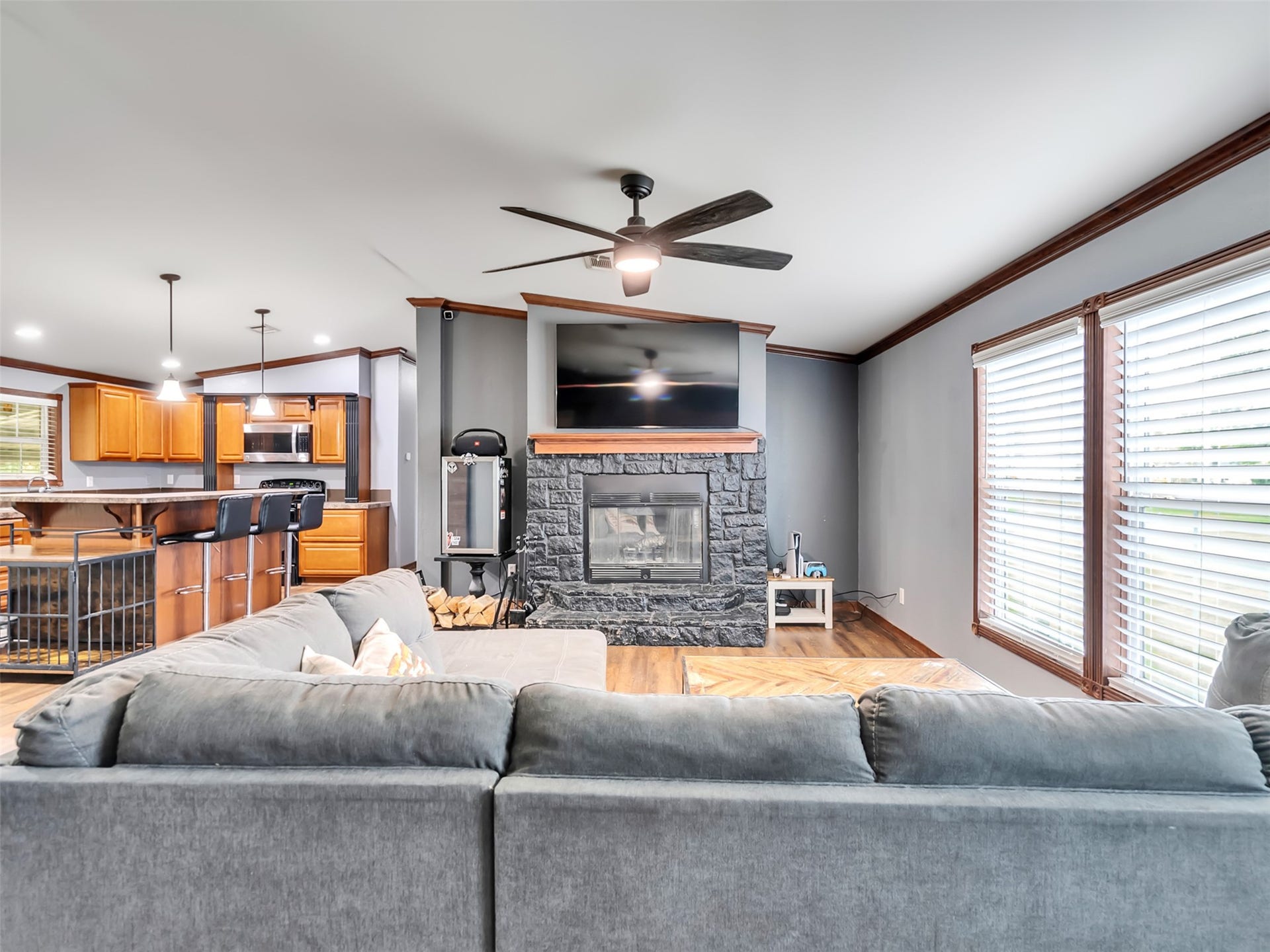 52 County Road 302, Alvin, TX 77511 Living room with wood burning fireplace