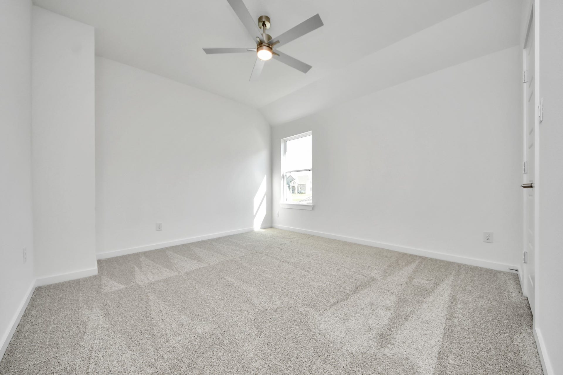 2056 Thimbleberry Lane, Magnolia, TX 77355 Generously sized secondary bedrooms featuring spacious closets, soft and inviting carpeting underfoot, large windows allowing plenty of natural light, and the added touch of privacy blinds for your personal retreat.