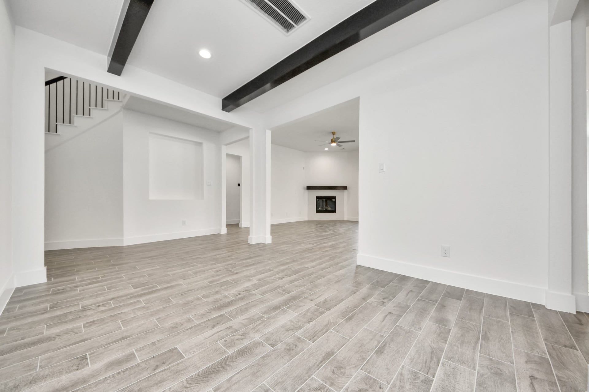 2056 Thimbleberry Lane, Magnolia, TX 77355 Create lasting memories with your family and friends at the dining table! This expansive dining room showcases sophisticated flooring, custom paint, and seamlessly connects to the family room and kitchen, providing an open and inviting atmosphere