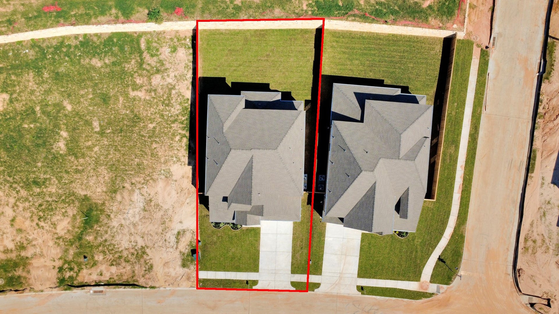 2056 Thimbleberry Lane, Magnolia, TX 77355 An aerial view of a spacious subdivision lot, highlighting a well-maintained yard and a fully fenced perimeter, offering both privacy and expansive outdoor space.