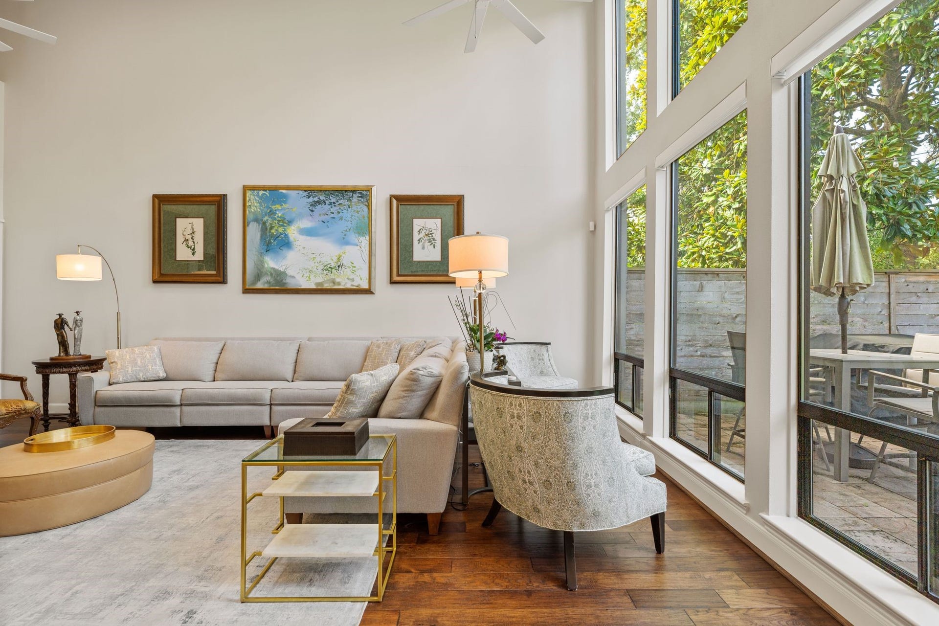 1918 Stoney Brook Drive, Houston, TX 77063 Expansive windows overlook the patio and greenery, creating a bright, comfortable spot for reading, conversation or simply enjoying the view.