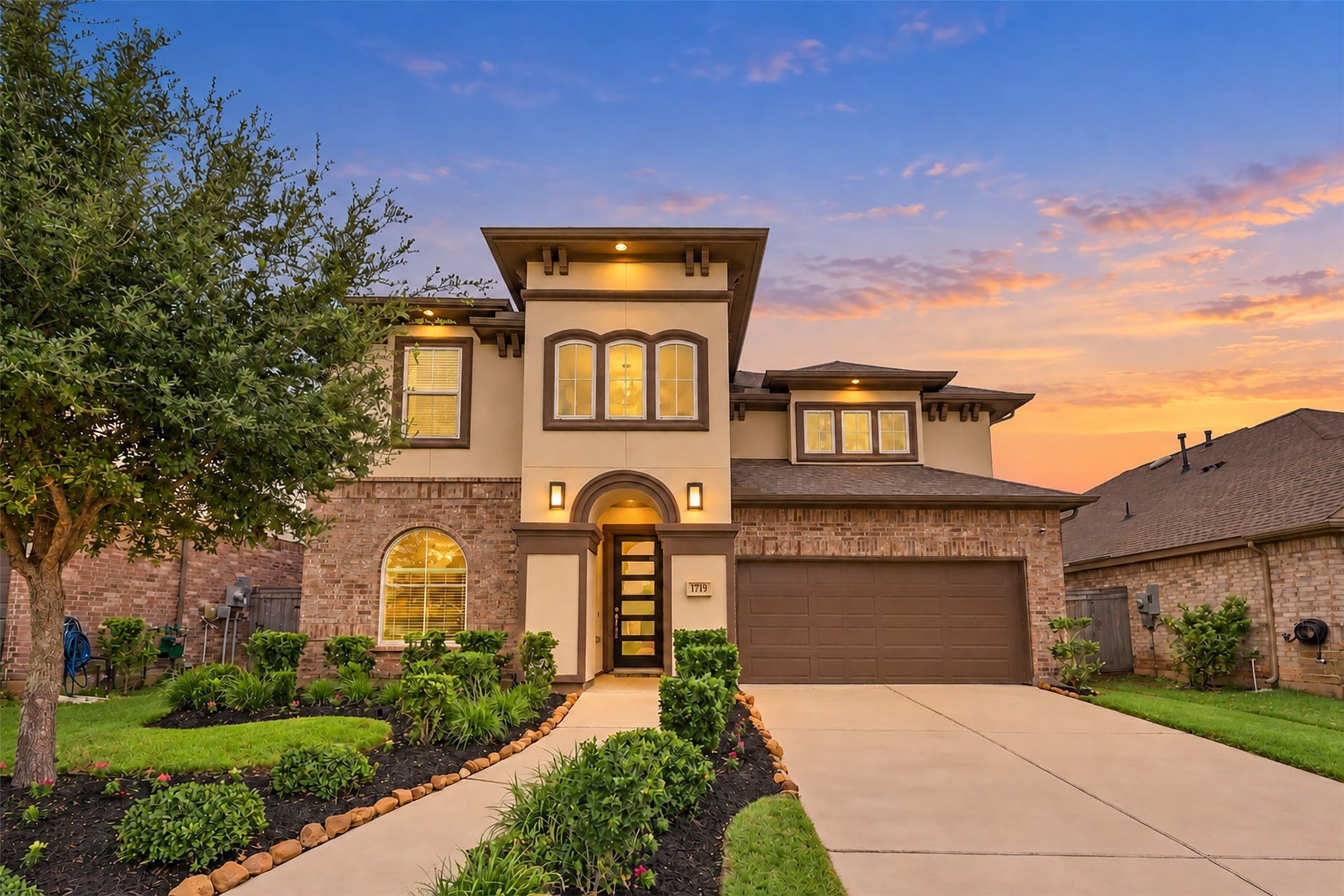 1719 Country Air Lane, Missouri City, TX 77459 THE WOW FACTOR starts at the curb! This BREATHTAKING two-story masterpiece dazzles with its stunning brick & stucco architecture, exquisite exterior details, lush manicured landscaping & grand, inviting entry! A SPECTACULAR blend of elegance, luxury & architectural beauty! Shows like a MODEL HOME! Prepare to FALL IN LOVE!
