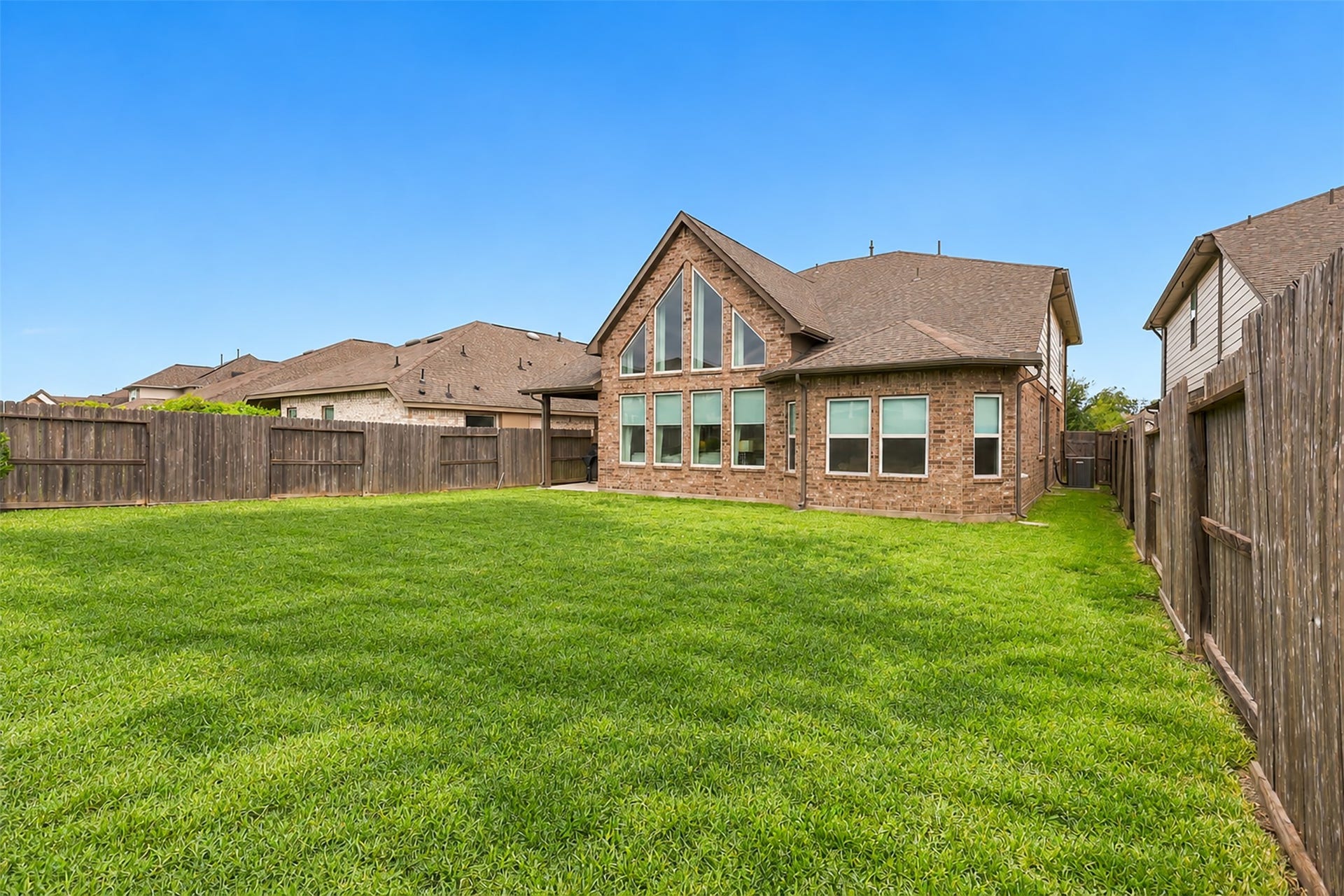 1719 Country Air Lane, Missouri City, TX 77459 WOW! THE BACKYARD YOU'VE BEEN DREAMING OF! Step outside and imagine the ENDLESS POSSIBILITIES this fabulous, spacious backyard has to offer! A beautiful stretch of lush green lawn surrounded by privacy fencing creates the PERFECT setting for outdoor entertaining, weekend barbecues, family fun, and your furry friends to play! Imagine designing your very own BACKYARD PARADISE with beautiful landscaping, an outdoor entertaining area, or MAYBE EVEN THAT SPARKLING SWIMMING POOL YOU'VE ALWAYS WANTED!