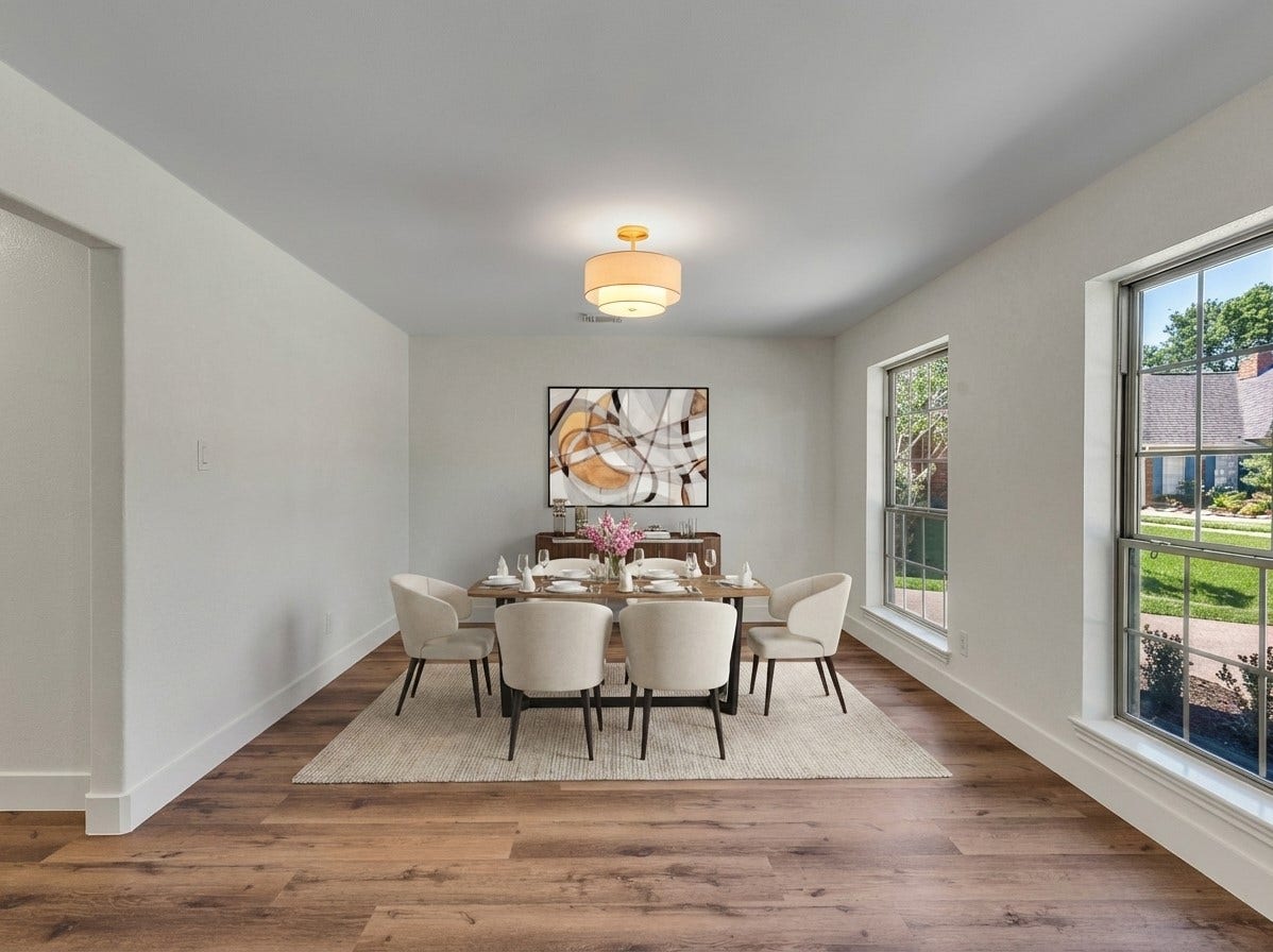 Room is virtually staged to show possibilities. Flexible space off the entry can be used as a formal dining room, office, or study.