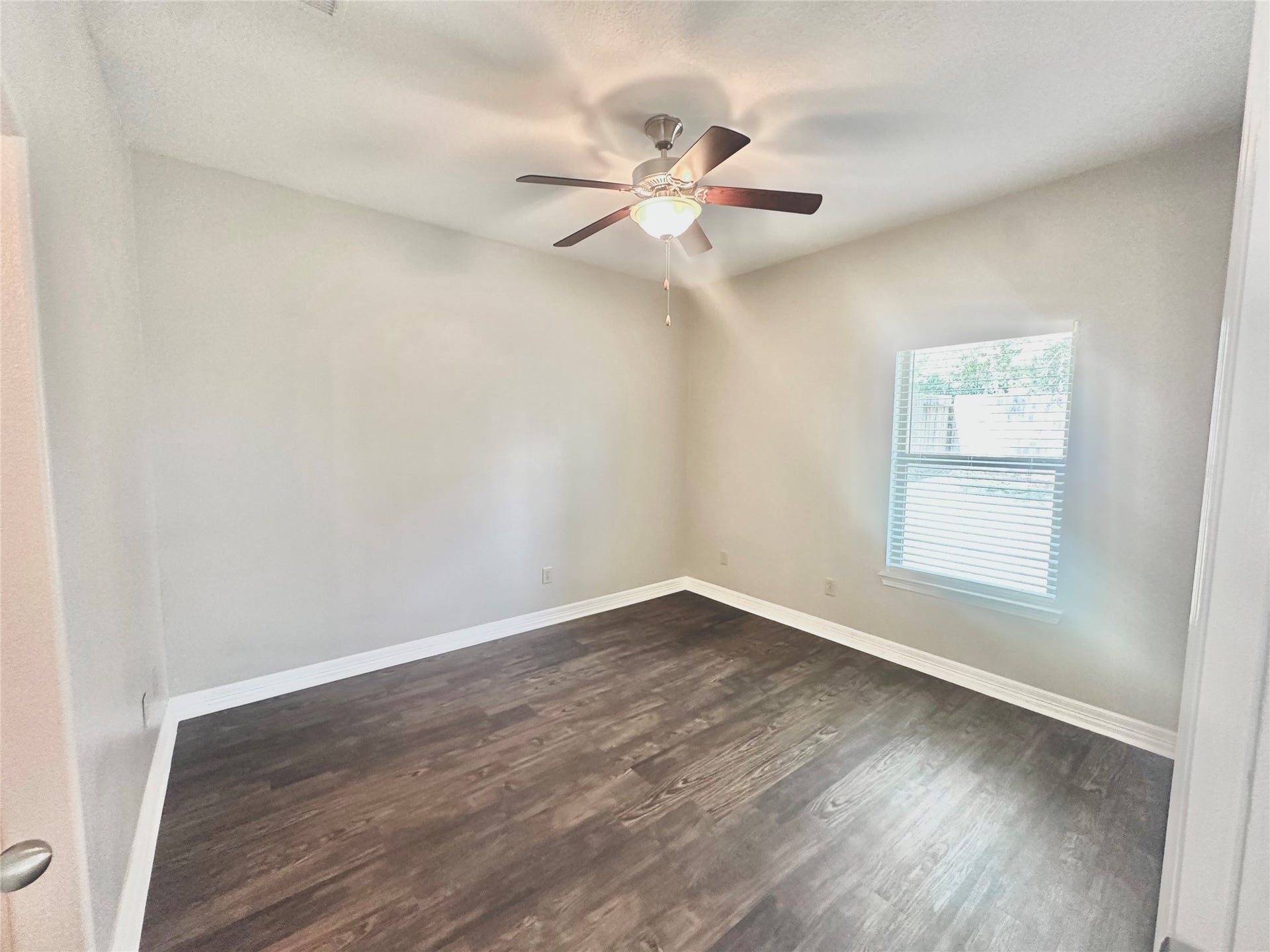 56 Woodland Hills Drive, #B, Conroe, TX 77303 BOTH BEDROOMS HAVE GREY VINYL WOOD LOOK FLOORING!