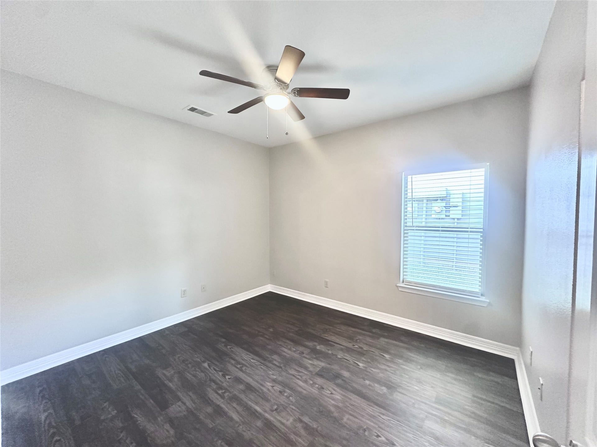 56 Woodland Hills Drive, #B, Conroe, TX 77303 BOTH BEDROOMS HAVE GREY VINYL WOOD LOOK FLOORING!