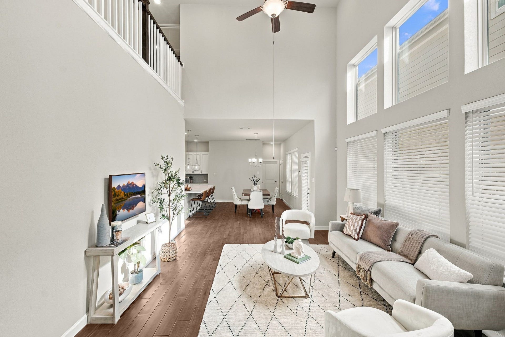 27022 Brighton Valley Way SW, Katy, TX 77494 A two story wall of windows and an open loft above. Light, elevated, unmistakable.