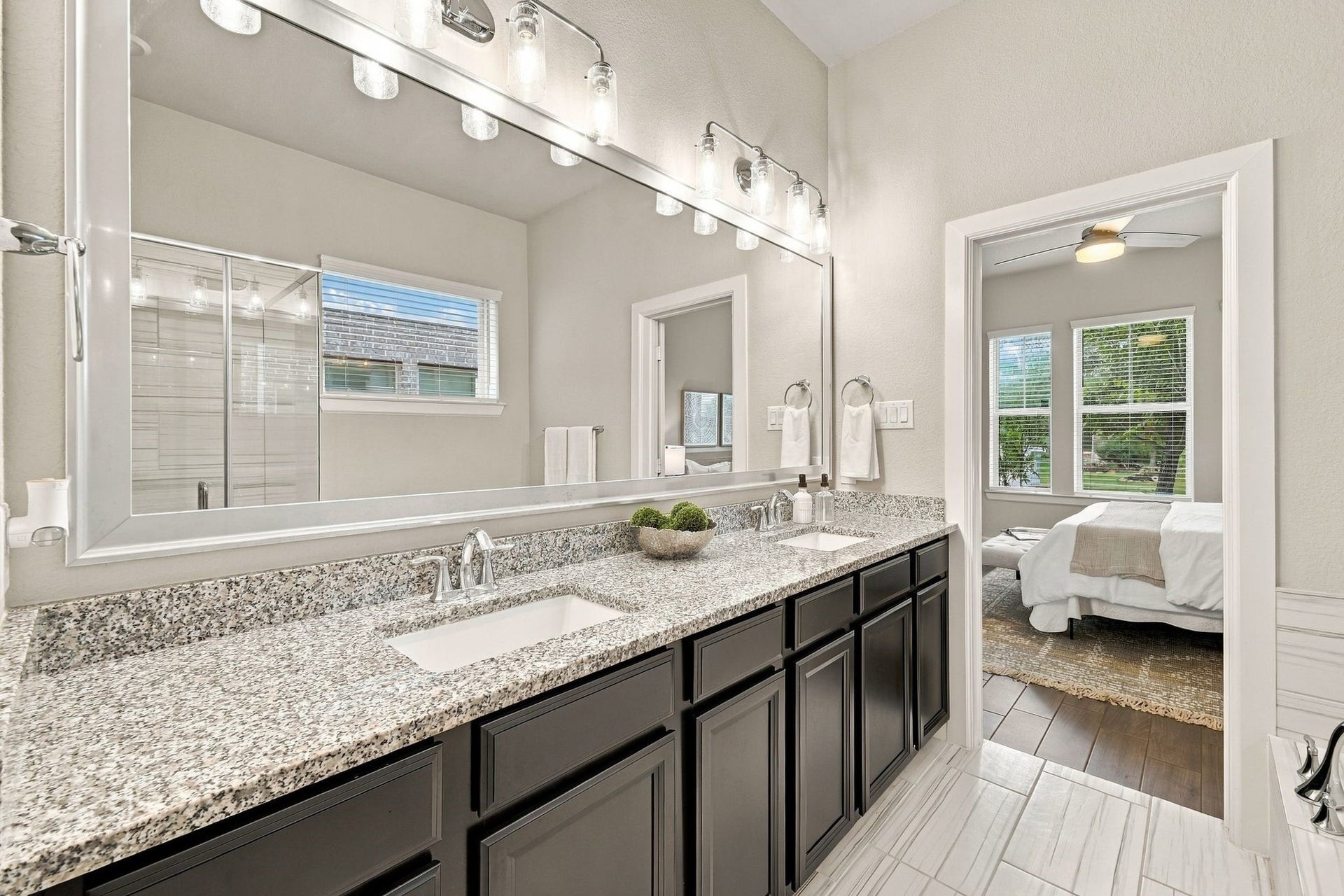 27022 Brighton Valley Way SW, Katy, TX 77494 Granite counters, dual sinks, direct access to the primary bedroom. No sharing sinks in this house.