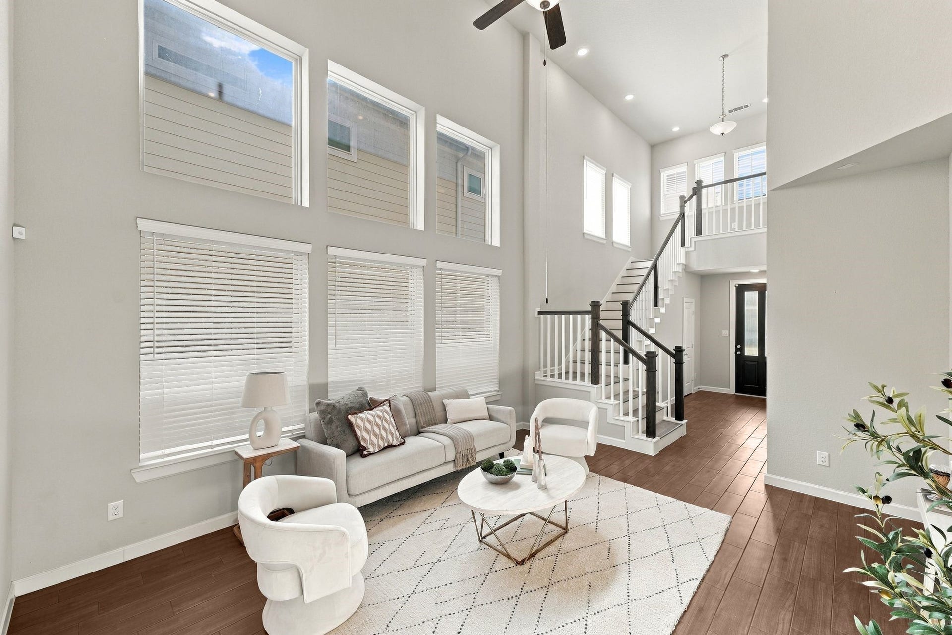 27022 Brighton Valley Way SW, Katy, TX 77494 Two story windows pour light into a living room built for first impressions, right off the entry.