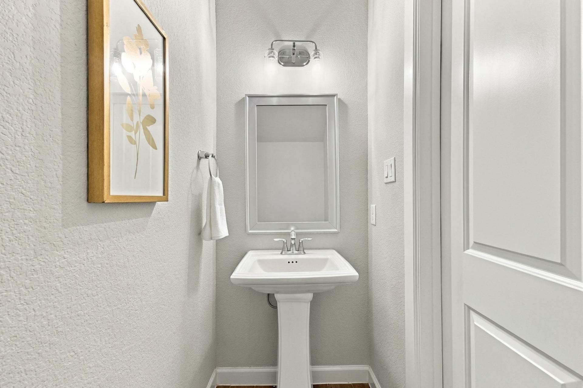 27022 Brighton Valley Way SW, Katy, TX 77494 A powder room finished for guests, not an afterthought.