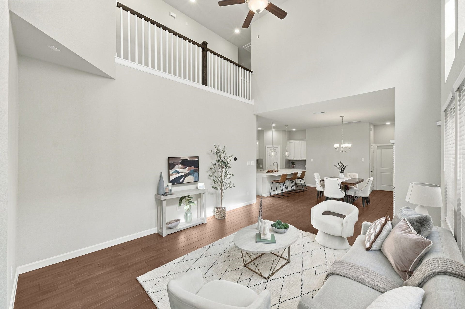 27022 Brighton Valley Way SW, Katy, TX 77494 Kitchen, living room, and loft share one continuous space. That is luxury done right.