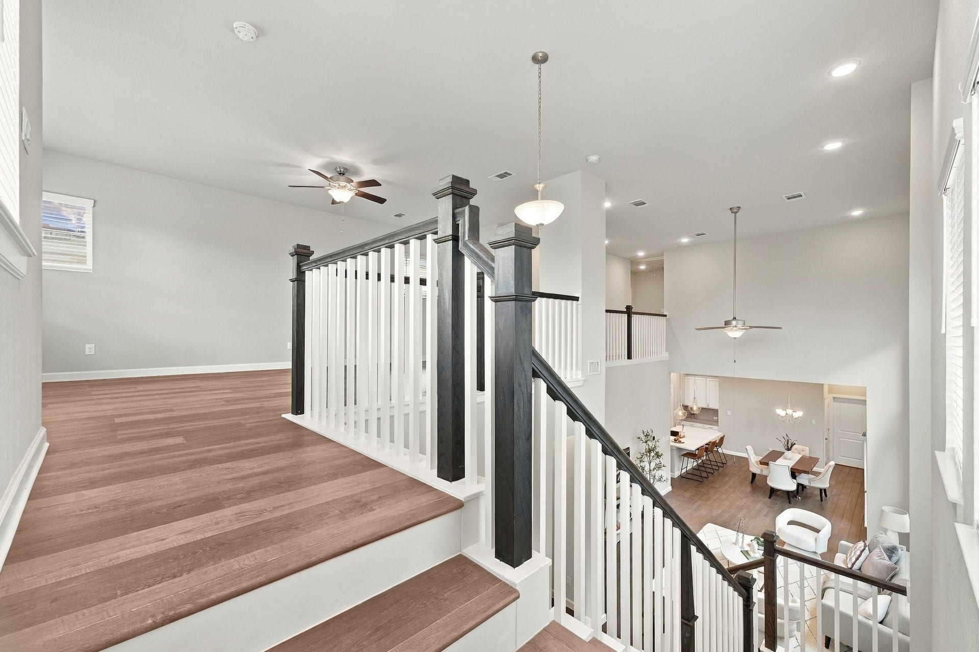 27022 Brighton Valley Way SW, Katy, TX 77494 The loft overlooks it all, staircase, entry, and the great room below.