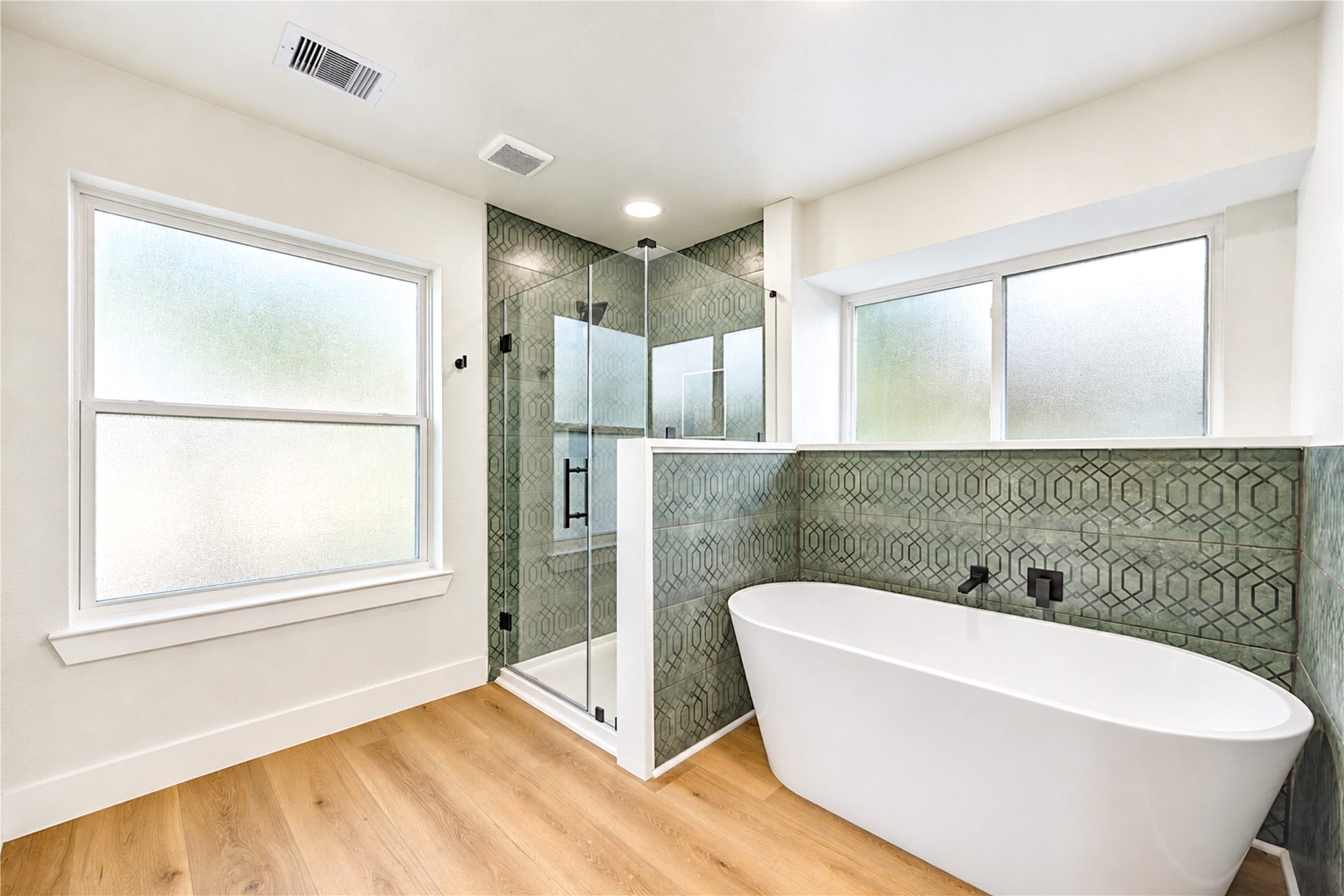 New enlarged shower and soaking tub