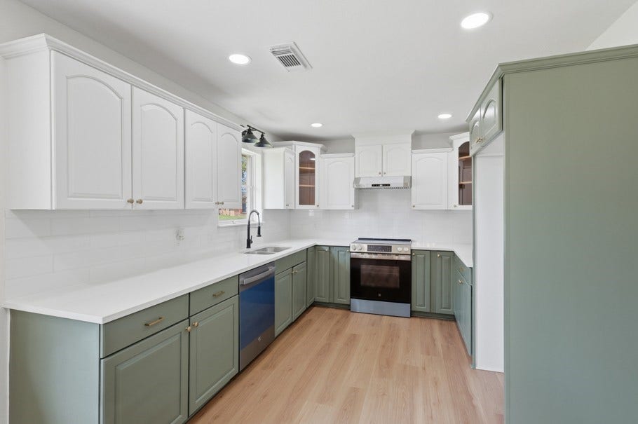 104 Oriole Lane, Angleton, TX 77515 The kitchen features timeless charm with beautifully restored original cabinetry, thoughtfully updated to ensure lasting appeal and functionality. New appliances, abundant natural light, and classic details create a warm and inviting space perfect for everyday living and entertaining.