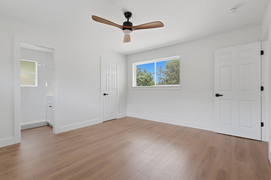 104 Oriole Lane, Angleton, TX 77515 The primary bedroom is thoughtfully separated from the secondary bedrooms, creating a private retreat for added comfort. Featuring abundant natural light, peaceful backyard views, and thoughtful updates throughout, this space offers a relaxing environment designed for peace of mind.