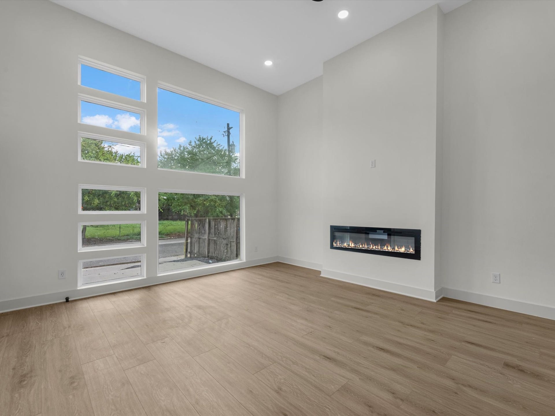 3307 Delhi Street, Houston, TX 77022 Unit #1 (first floor): Two story living room area, with fire place