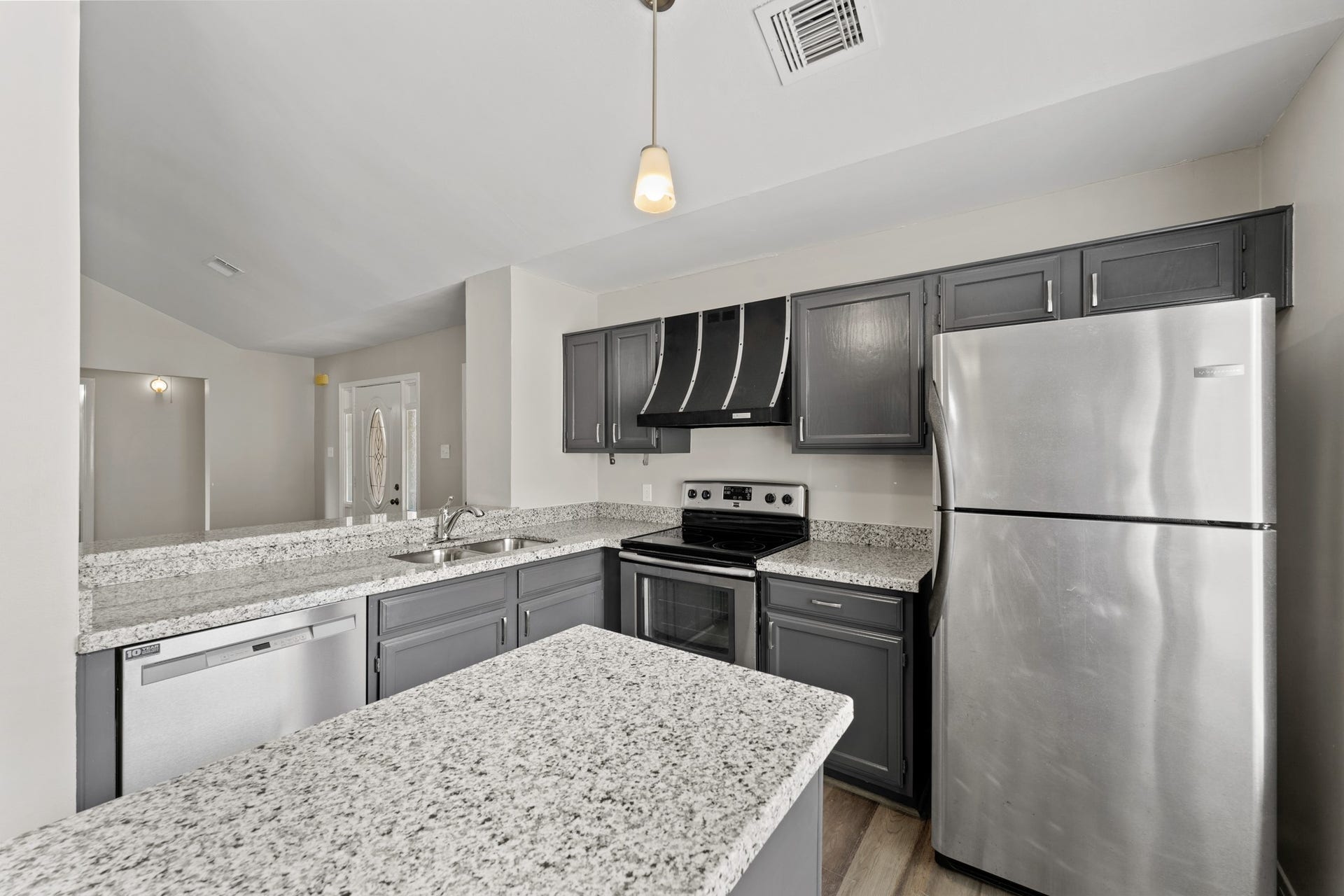 3926 Mill Rock Circle, Sugar Land, TX 77479 Don't miss this incredible kitchen! Featuring beautiful wooden cabinetry, granite counter tops, a large kitchen island and stainless steel appliances!