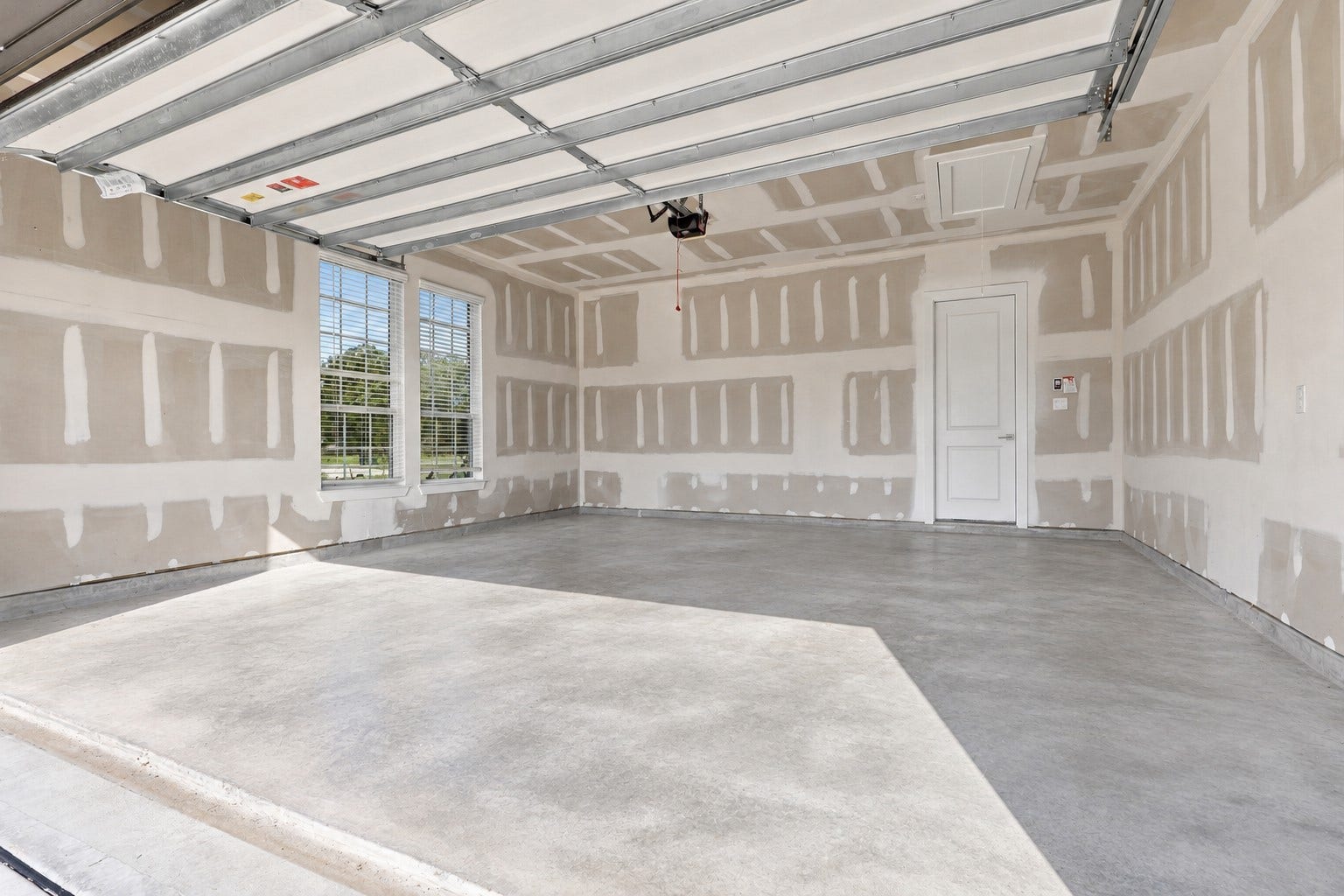 1051 Lakeland Circle, Rosharon, TX 77583 NOT YOUR ORDINARY GARAGE! This IMPRESSIVE ATTACHED GARAGE features EXTRA-DEEP DIMENSIONS, offering WONDERFUL SPACE for your vehicles, tools, storage & everyday essentials! Imagine the possibilities with all that EXTRA ROOM for organizing, hobbies, or creating your own workshop area! Whether you need additional storage or simply appreciate having room to spread out, this SPACIOUS GARAGE delivers CONVENIENCE, FLEXIBILITY & FUNCTIONALITY! ANOTHER FANTASTIC FEATURE OF THIS BEAUTIFUL HOME!