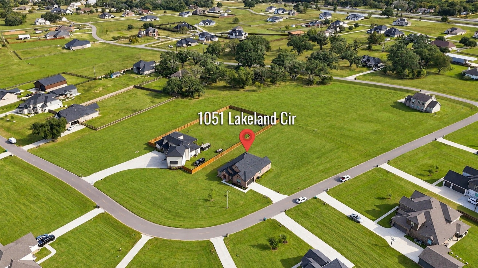 1051 Lakeland Circle, Rosharon, TX 77583 WHAT AN INCREDIBLE BIRD'S-EYE VIEW! Take a look from above and admire this home's setting within the surrounding neighborhood! The winding streets, attractive homes, and generous green spaces showcase the spacious layout of this residential community! A WONDERFUL perspective of the property's location and surroundings!